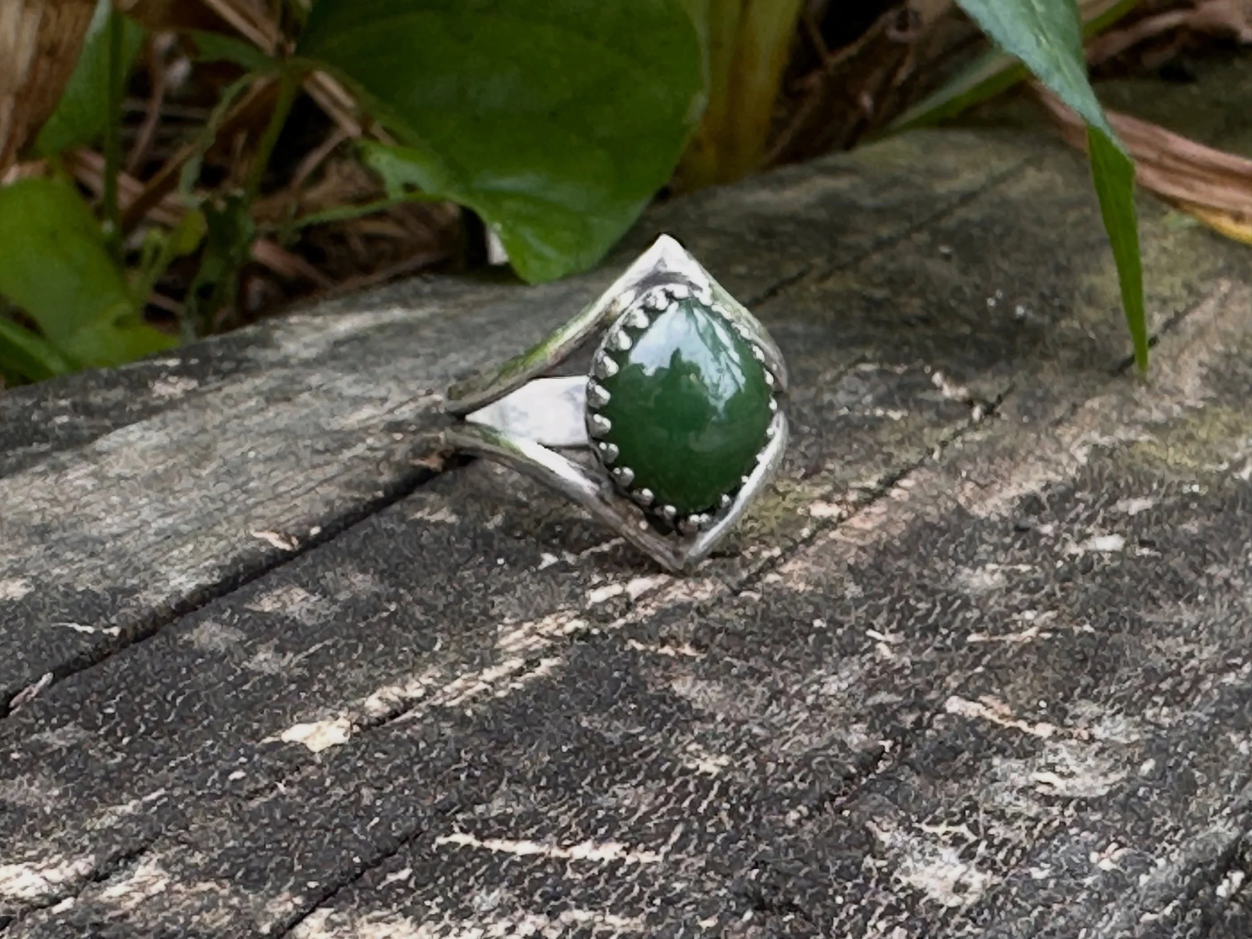 I&rsquo;ve been posting a lot of blues lately so I wanted to mix it up a bit.  The equilibrium ring sets a Marquis cut Jade stone in a symmetrical diamond formed silver band that follows the cut of the stone. #handcraftedsterlingsilverjewelry #jaderi