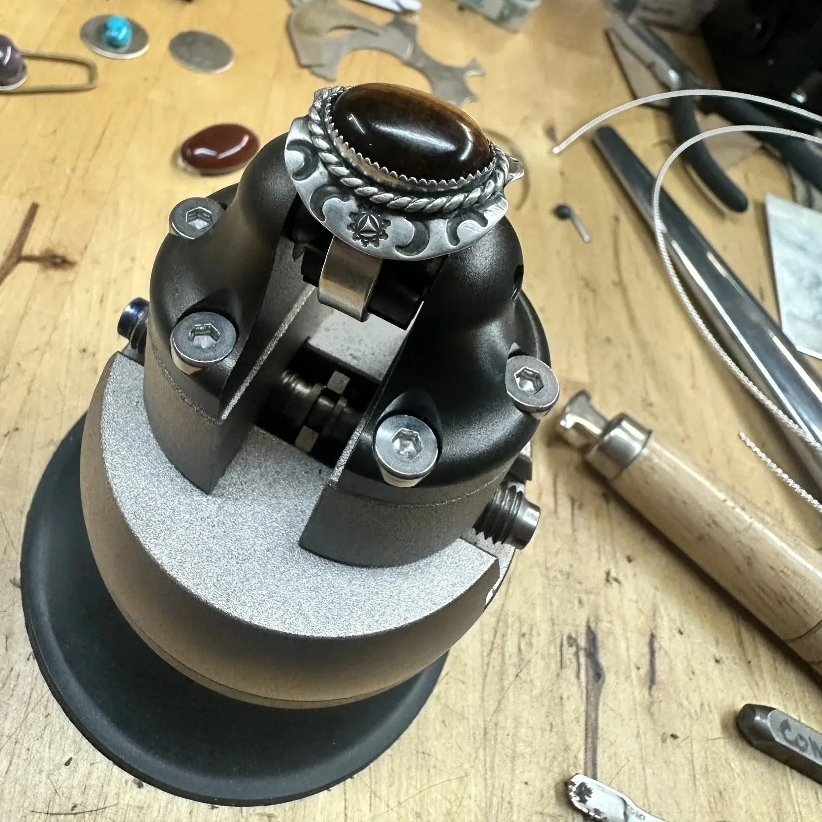 Tiger's eye cabochon set into the shield ring