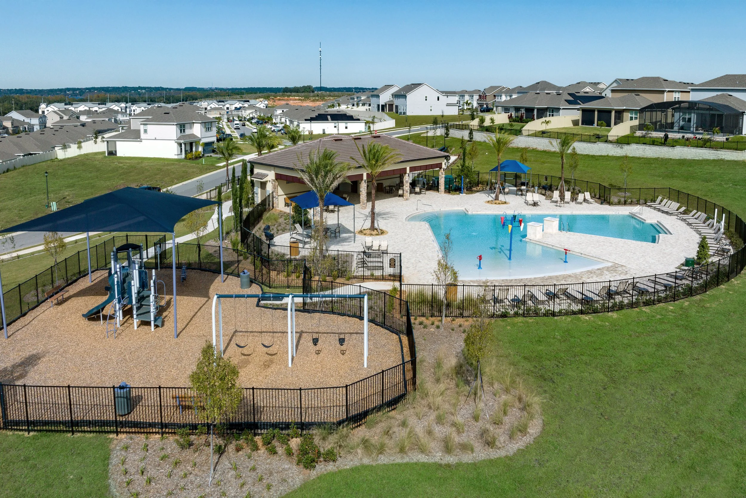 Zero-entry swimming pool with splash zone & cabana