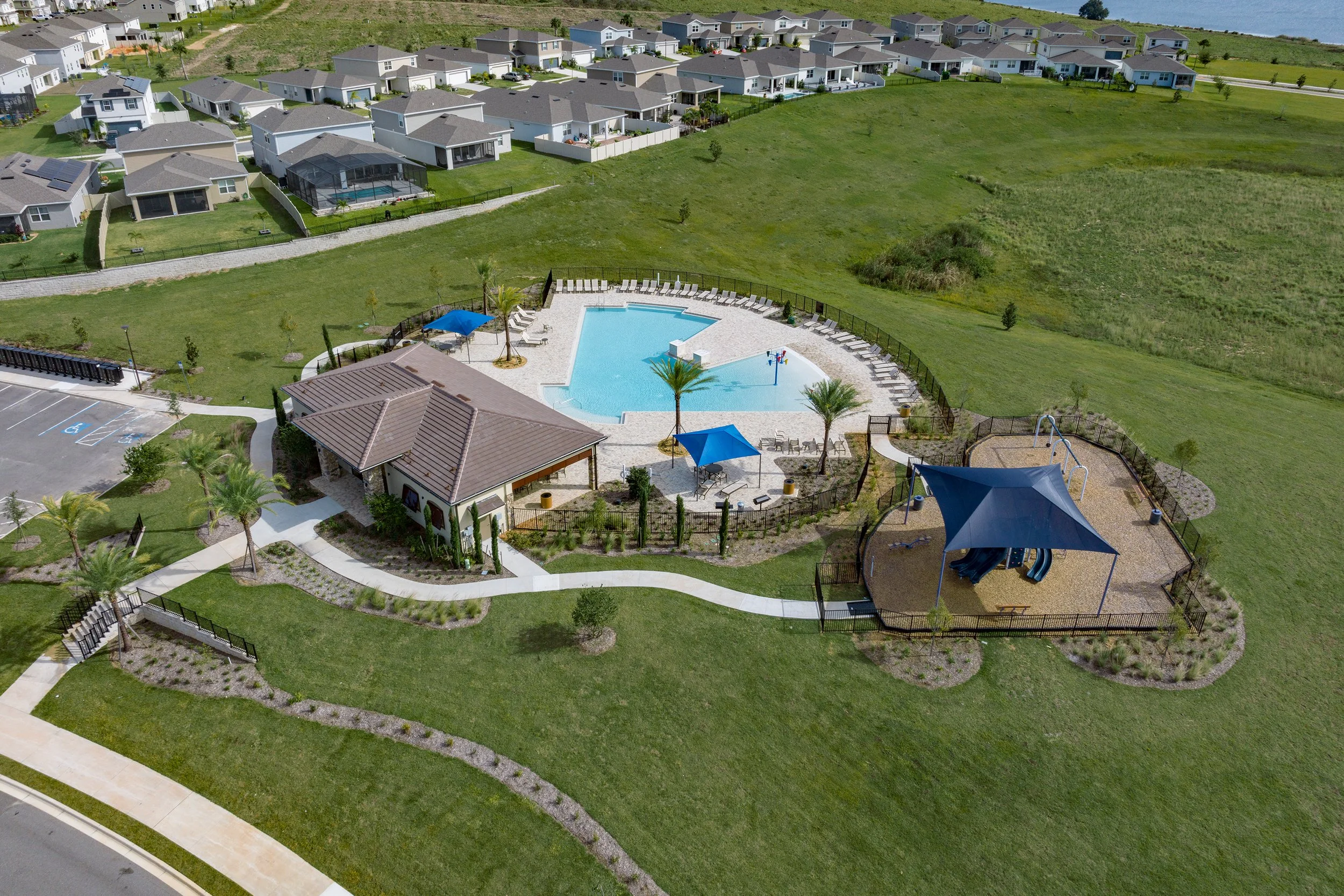 Zero-entry swimming pool with splash zone & cabana