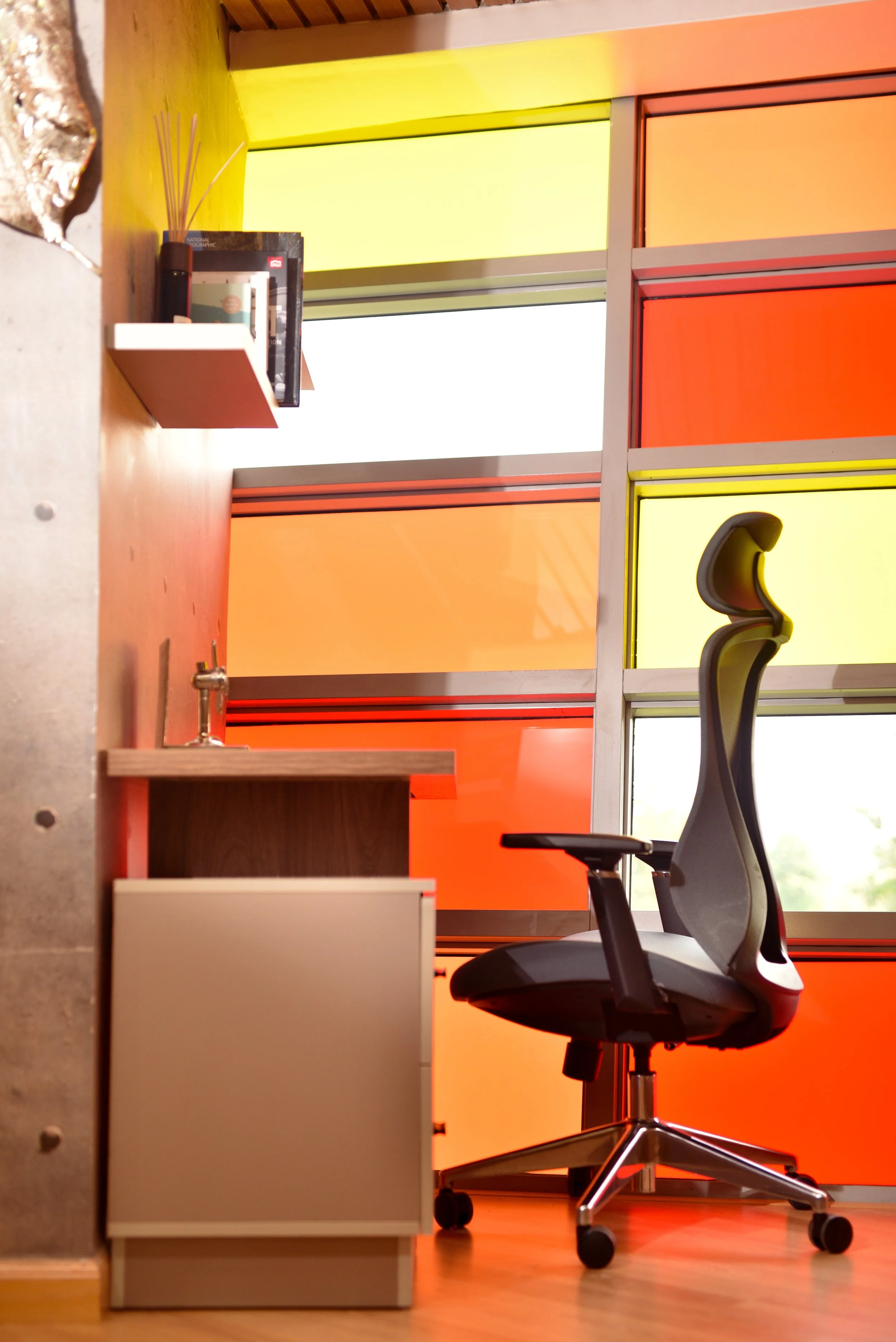 Ergonomic task station positioned within staff wellness area for flexible worki