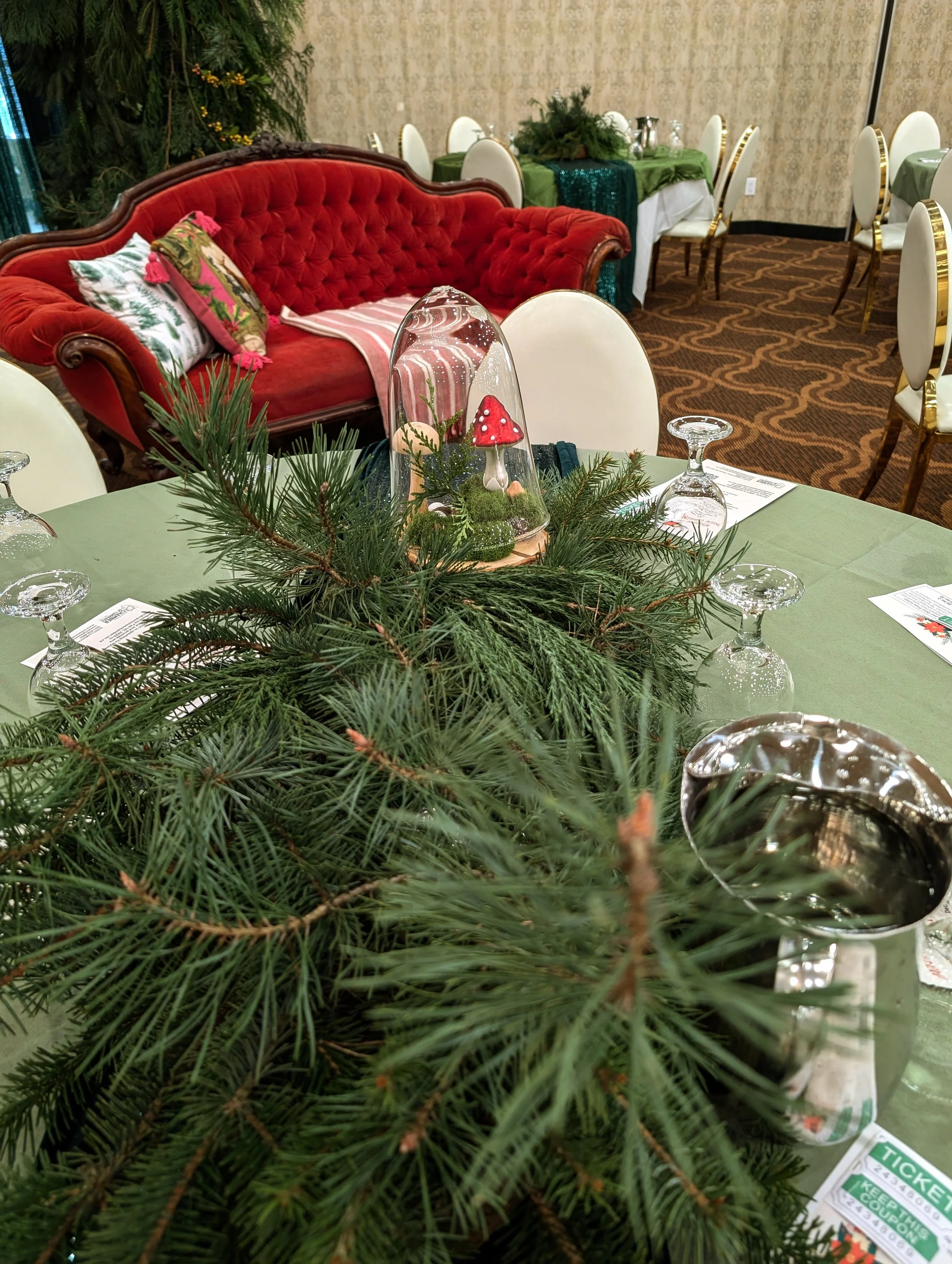 Themed holiday dinner decor for corporate holiday party