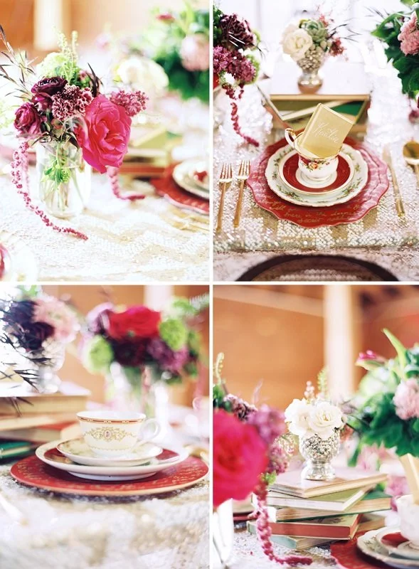 Elegant table setting with floral arrangements, vintage china, and gold cutlery for a special occasion or wedding feast.