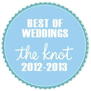 A circular badge with a light blue background, white text stating "Best of Weddings the knot 2012-2013".