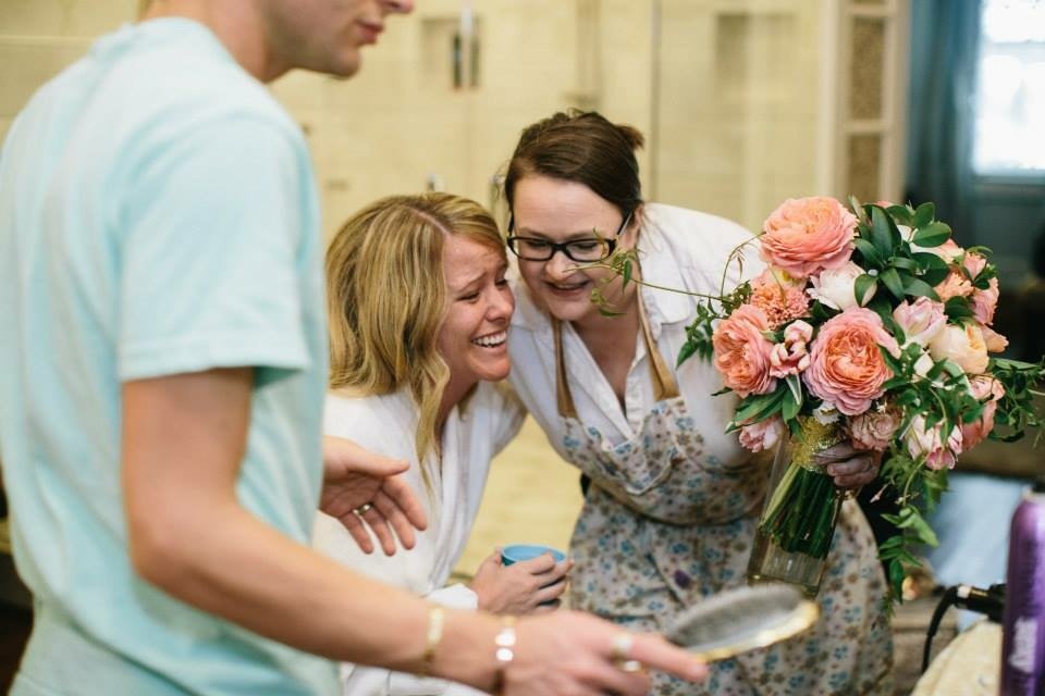 A to Zinnias delivering a bridal bouquet
