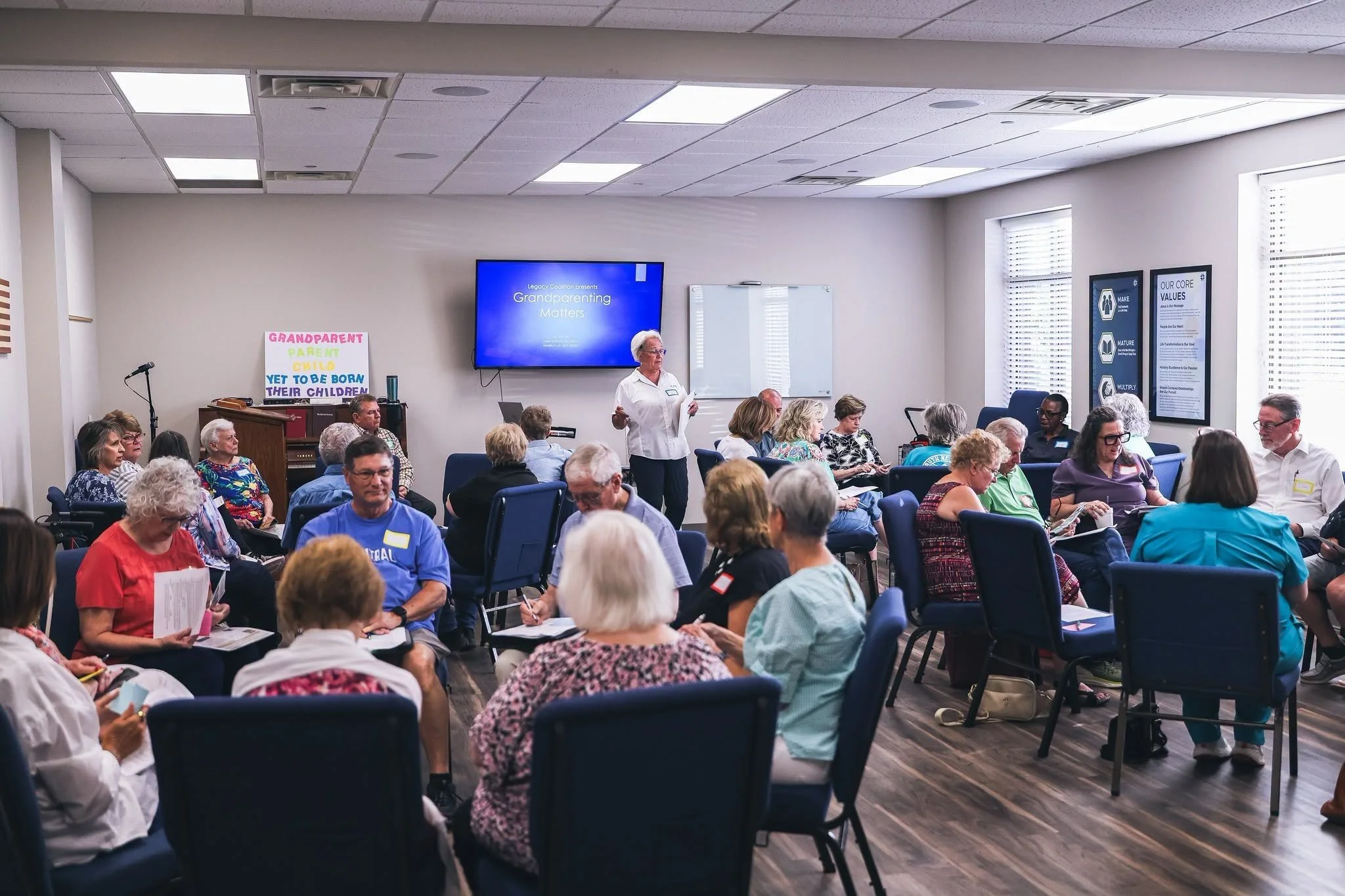 Senior adults gathered for lunch and a program at OASIS