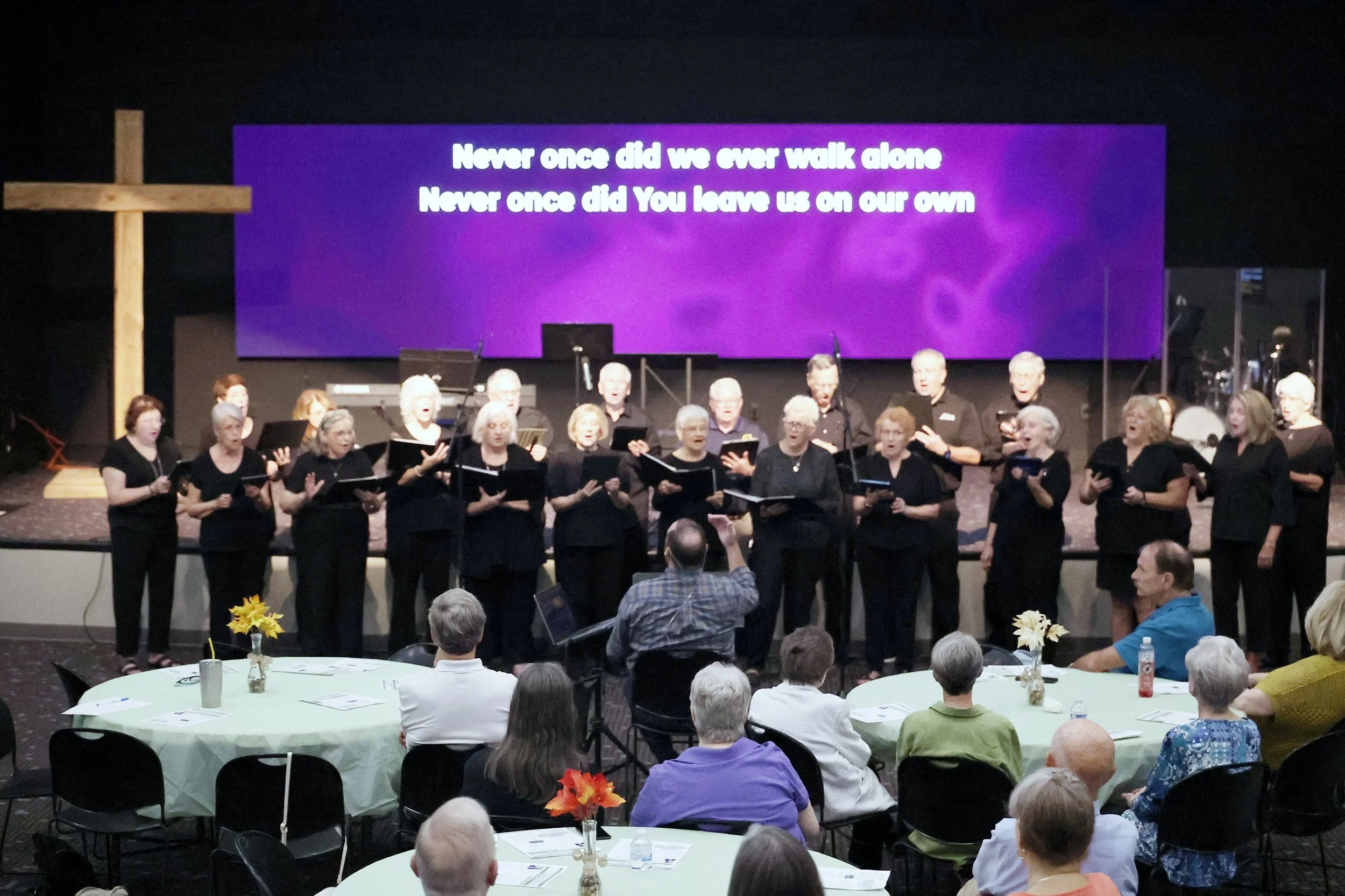 The Central Baptist Senior Adult Choir singing for a gathering of senior adults