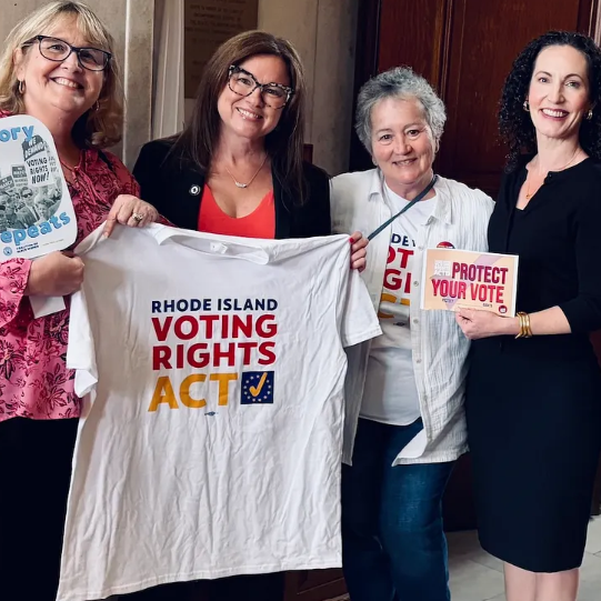 Supporters and legislators pictures with RIVRA postcards and RIVRA t-shirts