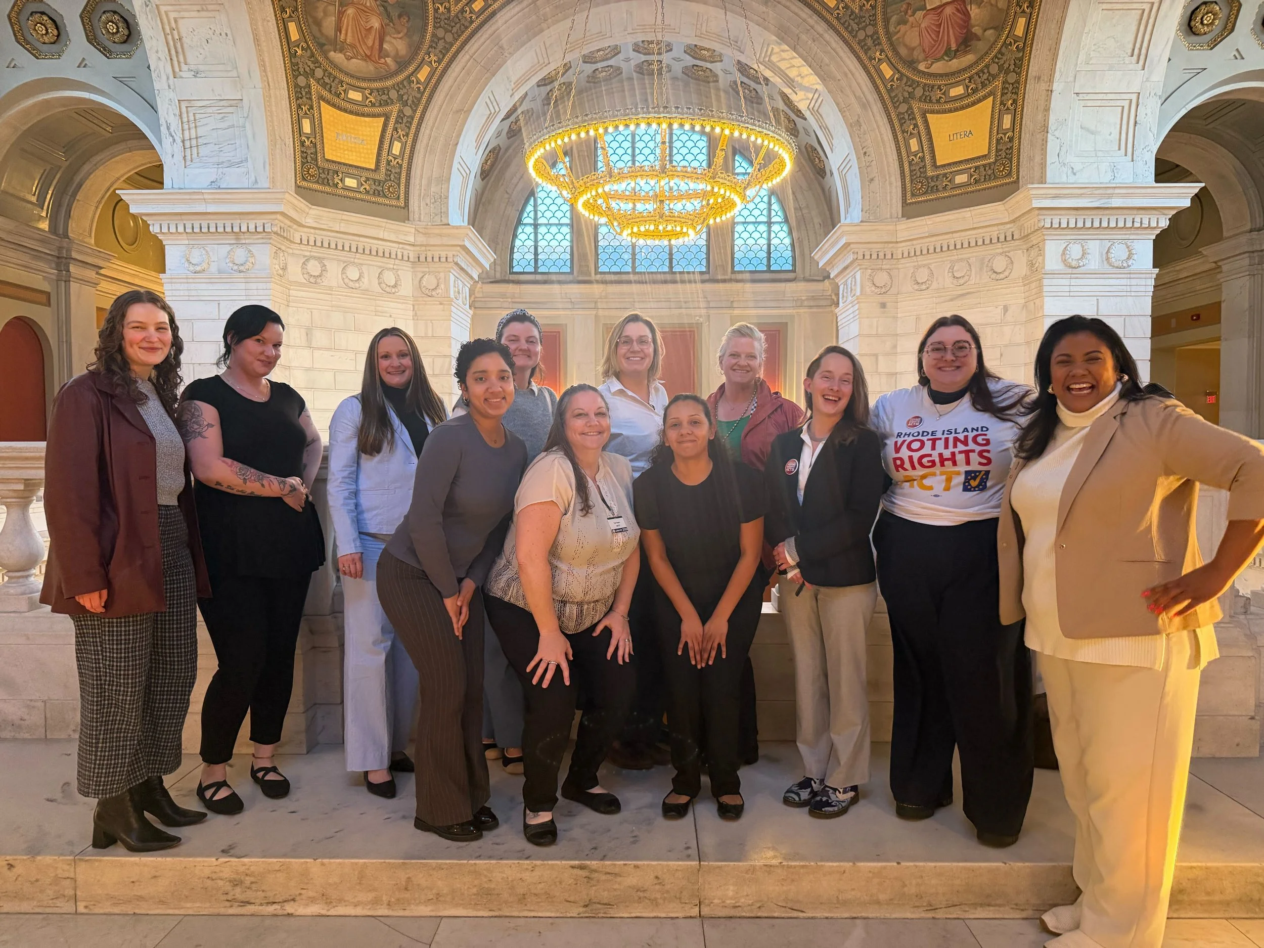 Voting rights advocates pictured together at the Rhode Island State House