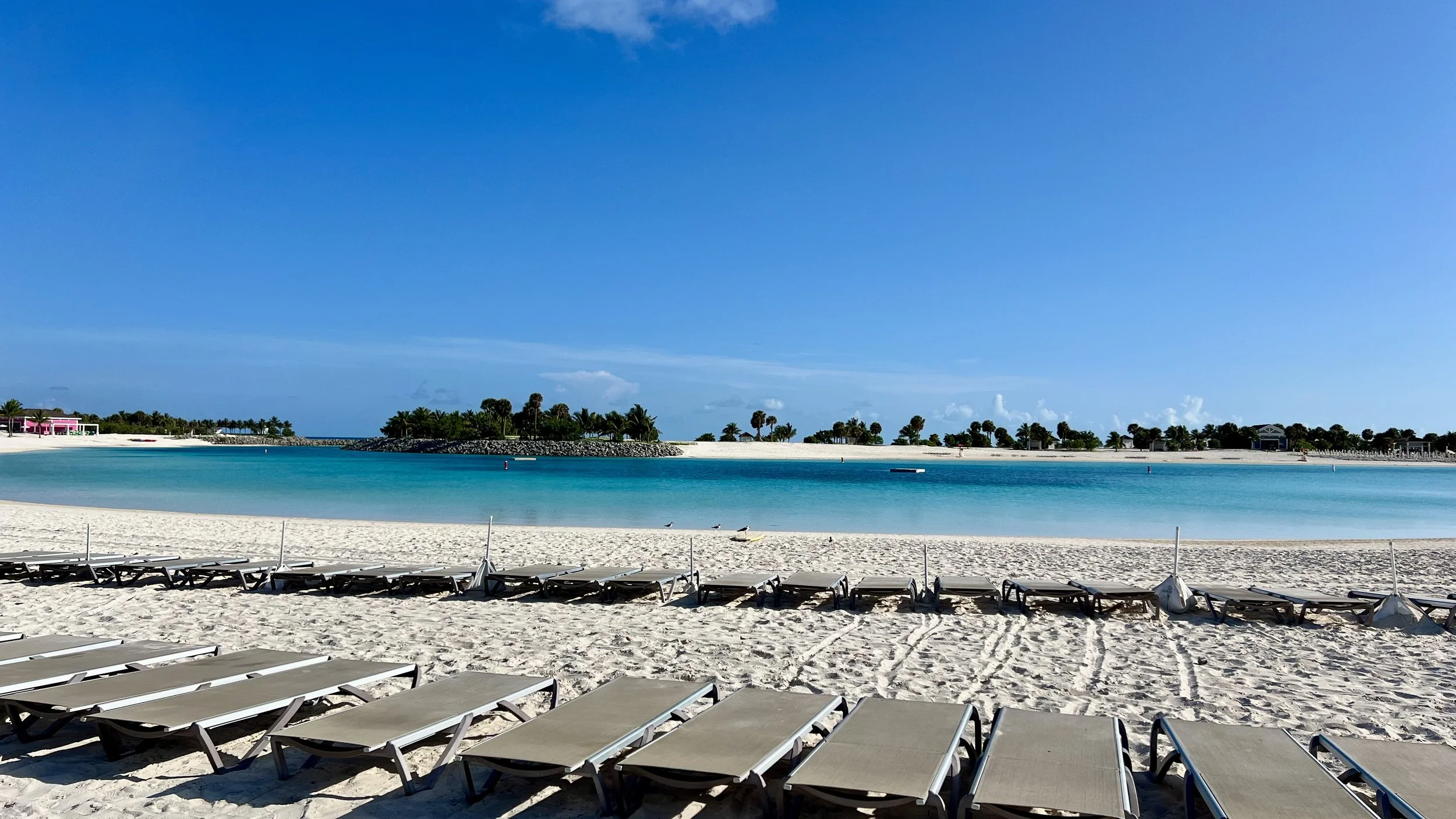 Sun loungers on South Beach lagoon on MSC Ocean Cay