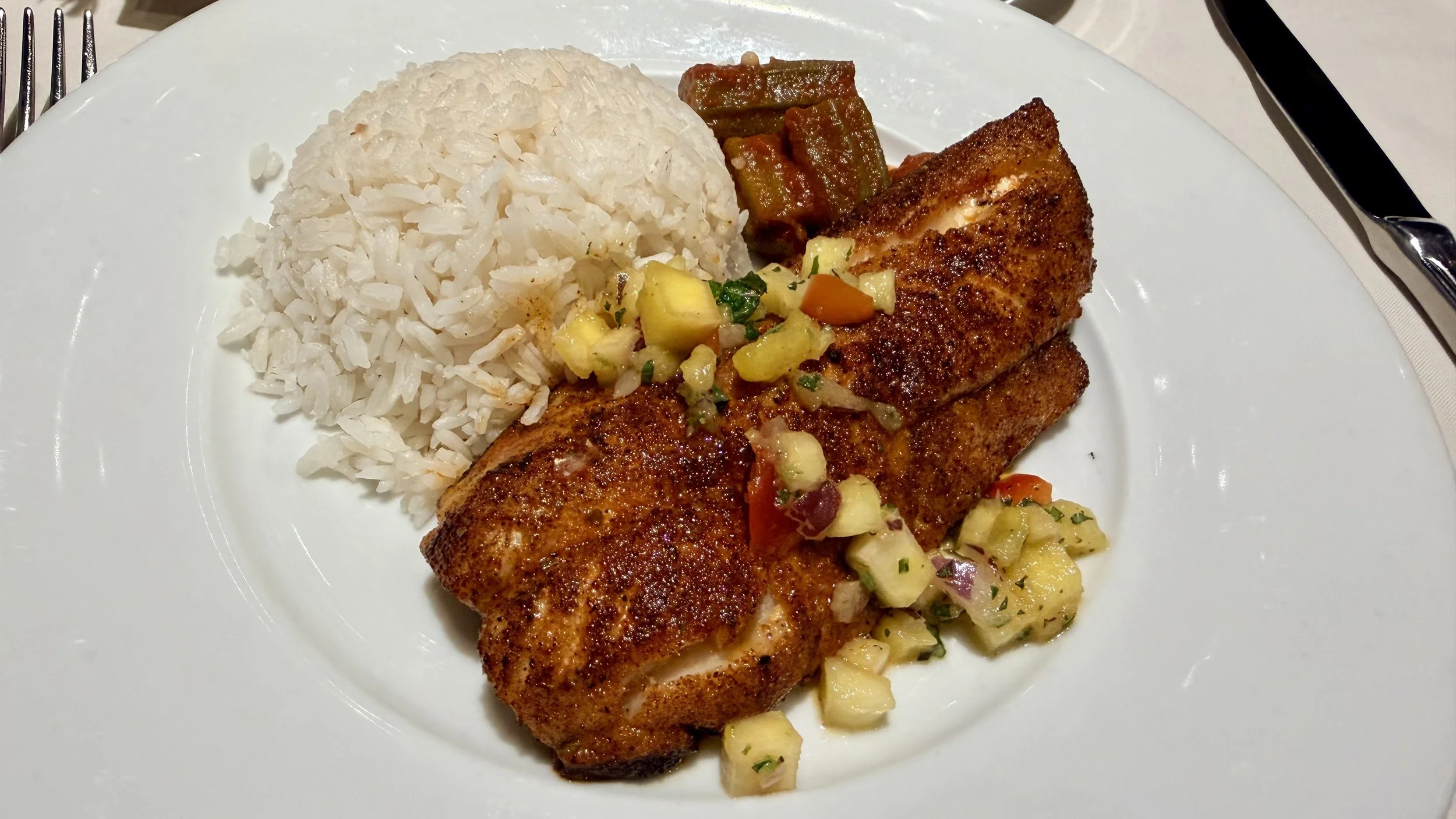 Caribbean Snapper entree with rice and okra in Main Dining Room on MSC Seashore