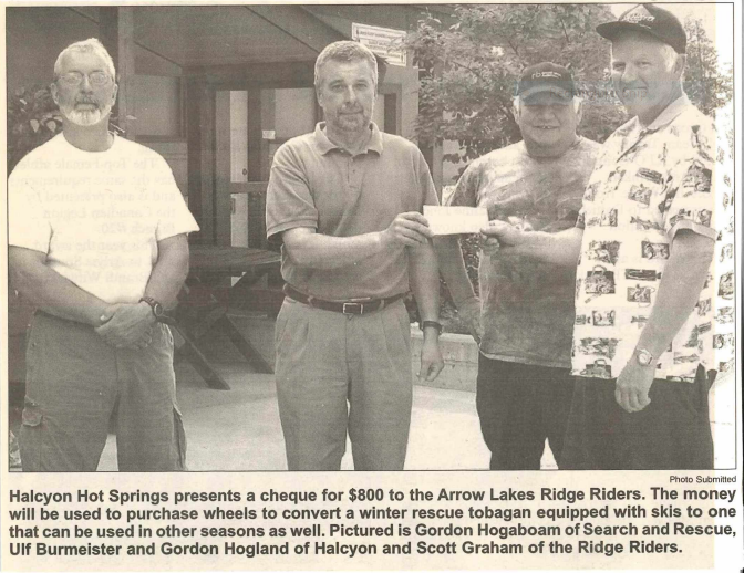 The donation is for $800 from Halcyon Hot Springs to Arrow Lakes Ridge Riders, intended for purchasing wheels to convert a rescue TOGABAN with skis for year-round use. 