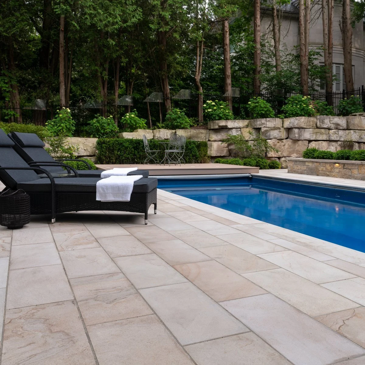 Outdoor living backyard with landscaped garden beds in Roanoke, VA