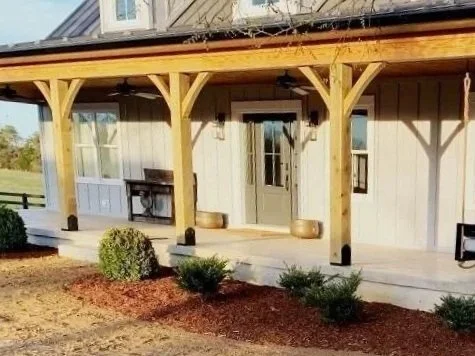 Landscape installation around covered porch outdoor living space in Roanoke, VA