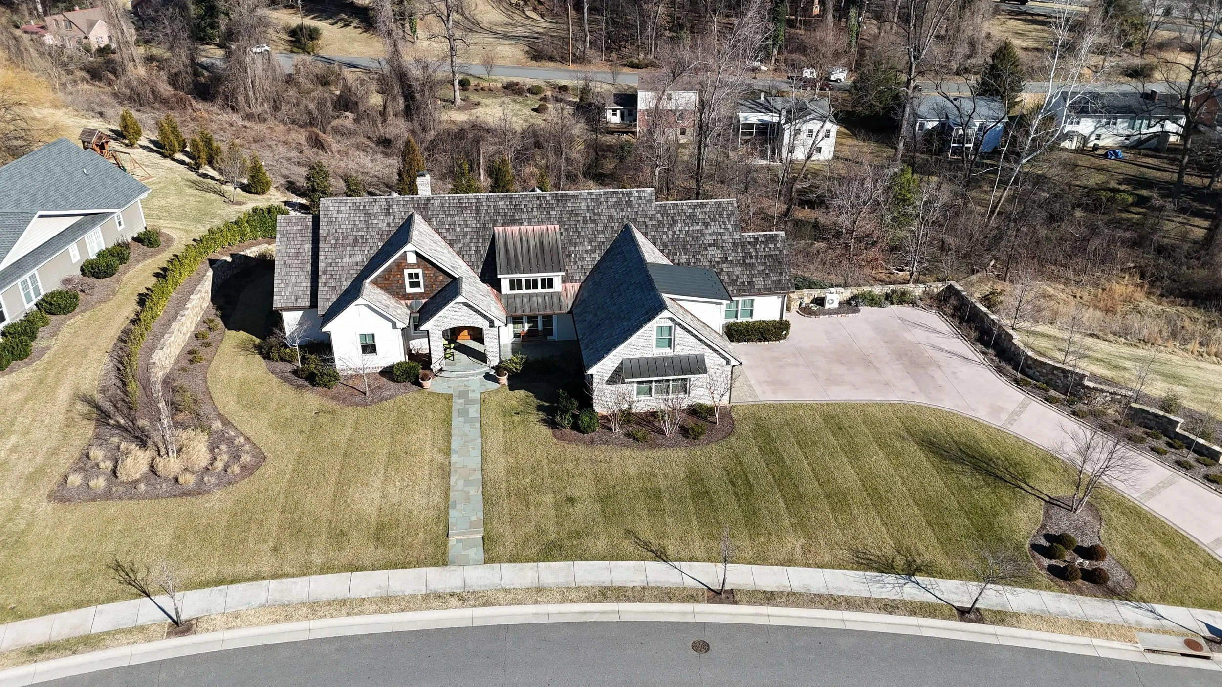 Large custom concrete driveway with retaining wall and full property layout in Bedford, VA.jpeg