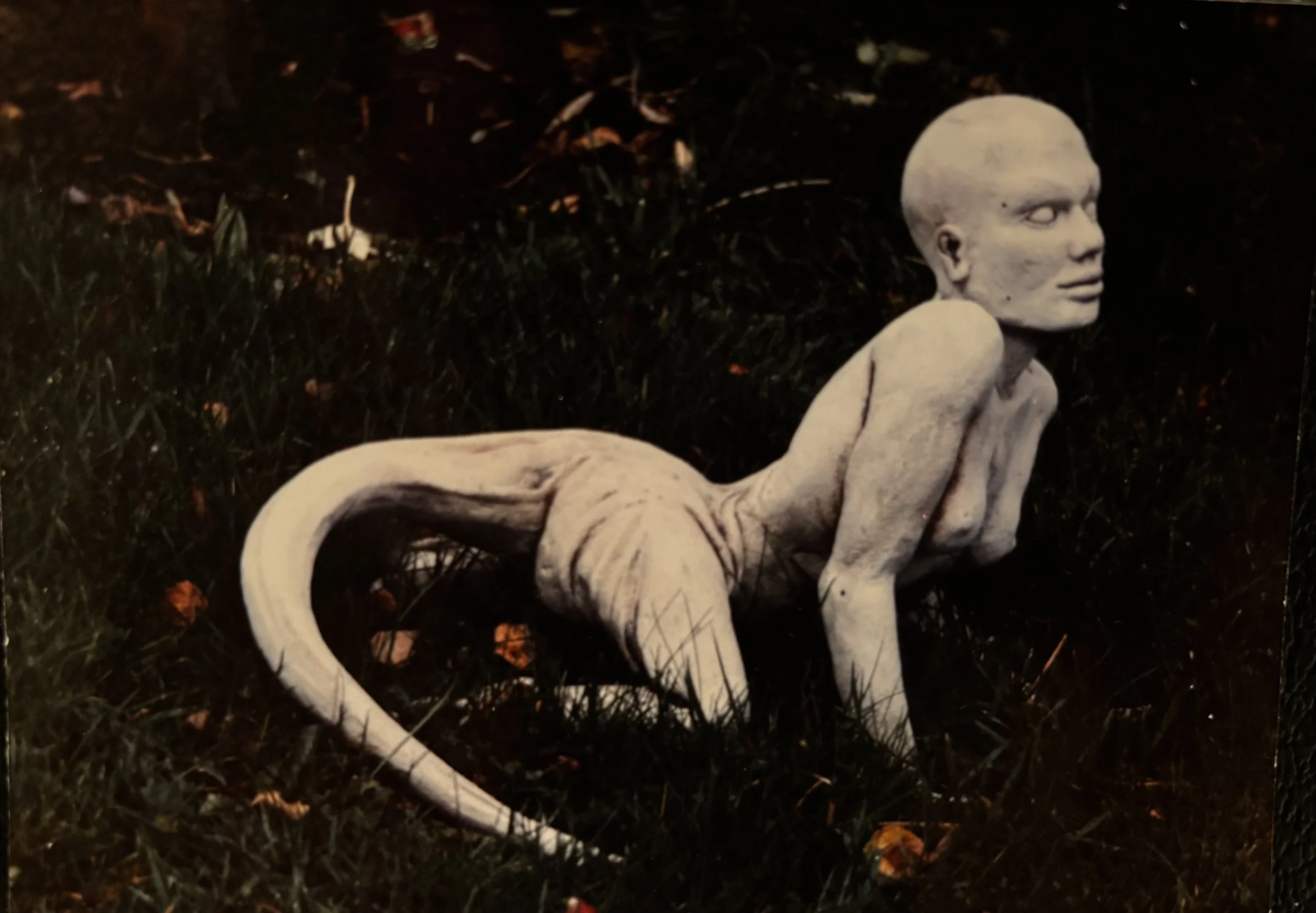 A close-up side shot of the Lizard Women statue on the grounds of Boleskine Lodge. Not sure of its meaning or why it was there. But it does seem to align with Pages occult interest at the time. Shot in October 1982. - ©2026 therushsculptor..com
