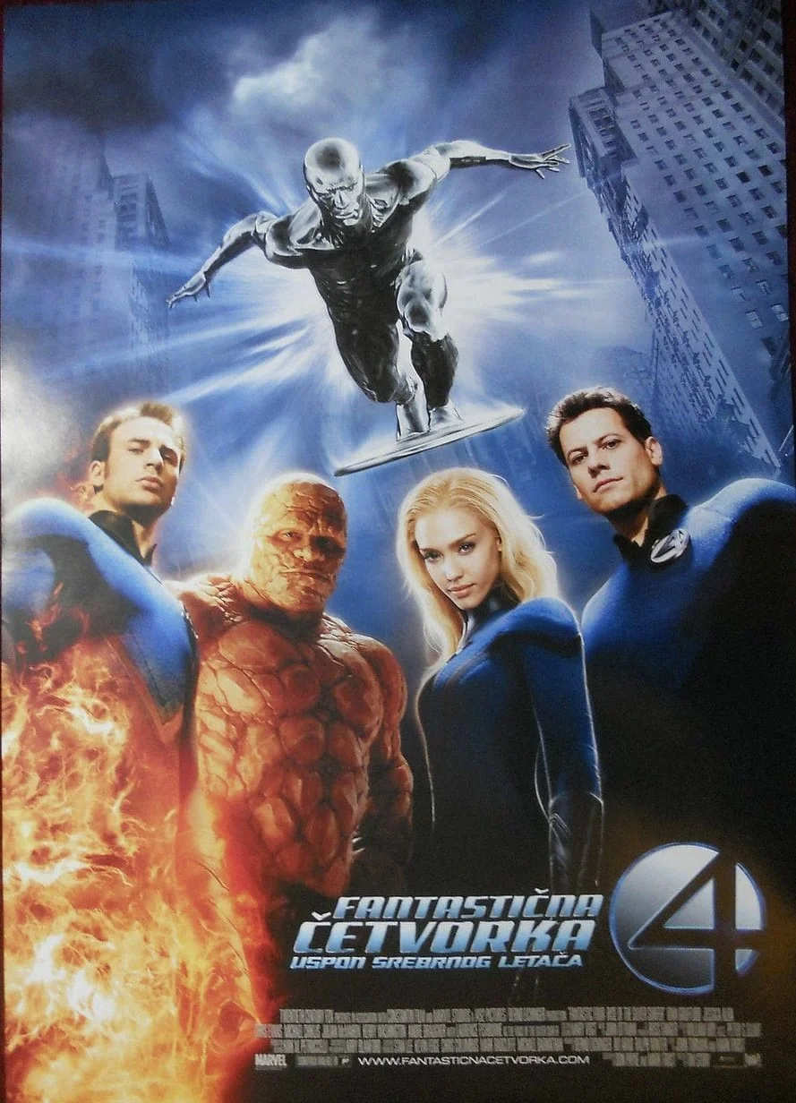 Poster for the movie 'Fantastic Four' featuring four main characters: a woman with blonde hair in a blue suit, a muscular red-orange character with cracked skin, a man with dark hair and a blue suit, and another man with dark hair in a blue suit, wit