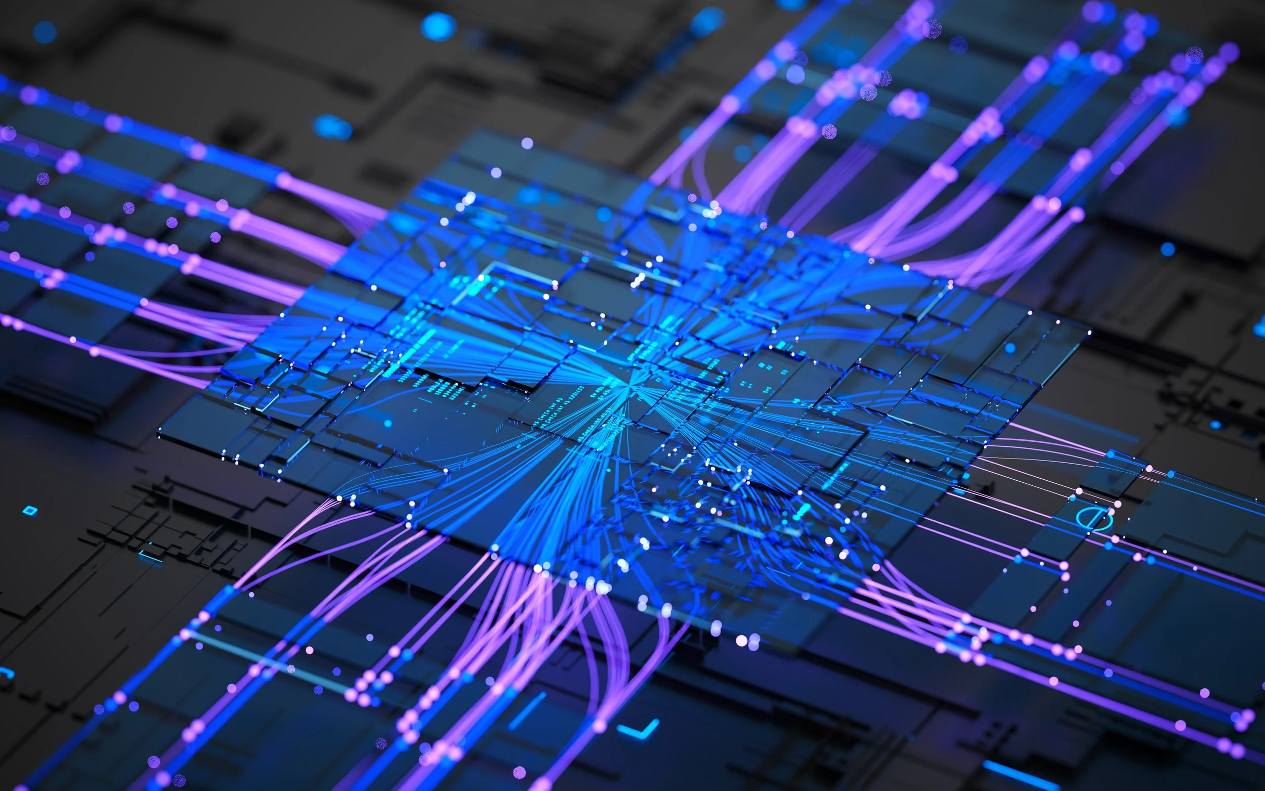 Close-up of a computer microchip with glowing purple and blue circuit pathways.
