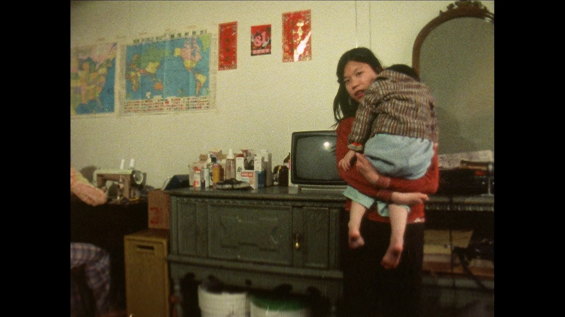 Bittersweet_survival_little girl holding brother.jpeg