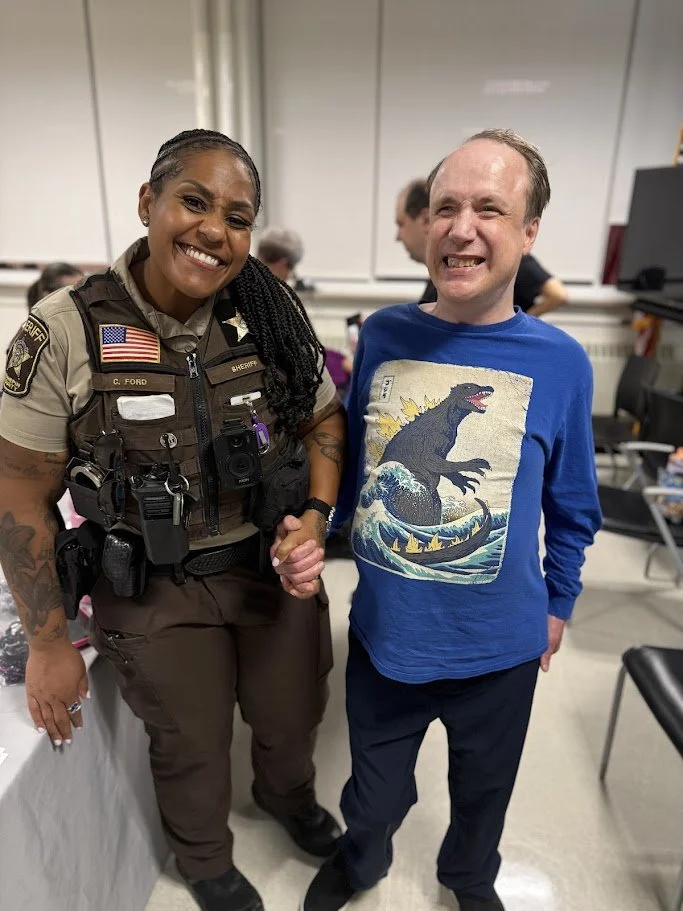 A SOAR Friend with a Hennepin County Officer at our Safety with Sherriff Night Fall 2025