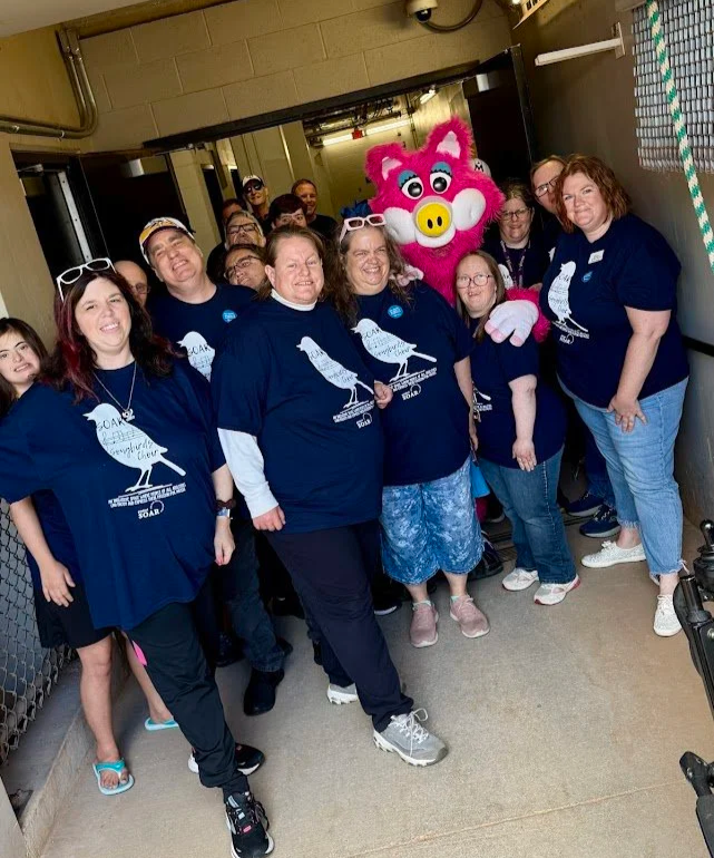 A Group of SOAR Songbirds with Mudonna the mascot of the Saint Paul Saints August 2025