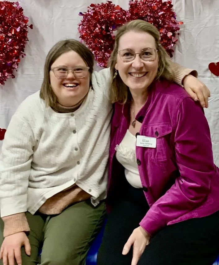 A SOAR friend and SOAR instructor using the Photo Op Spot at our Valentine's Dinner Date February 2026