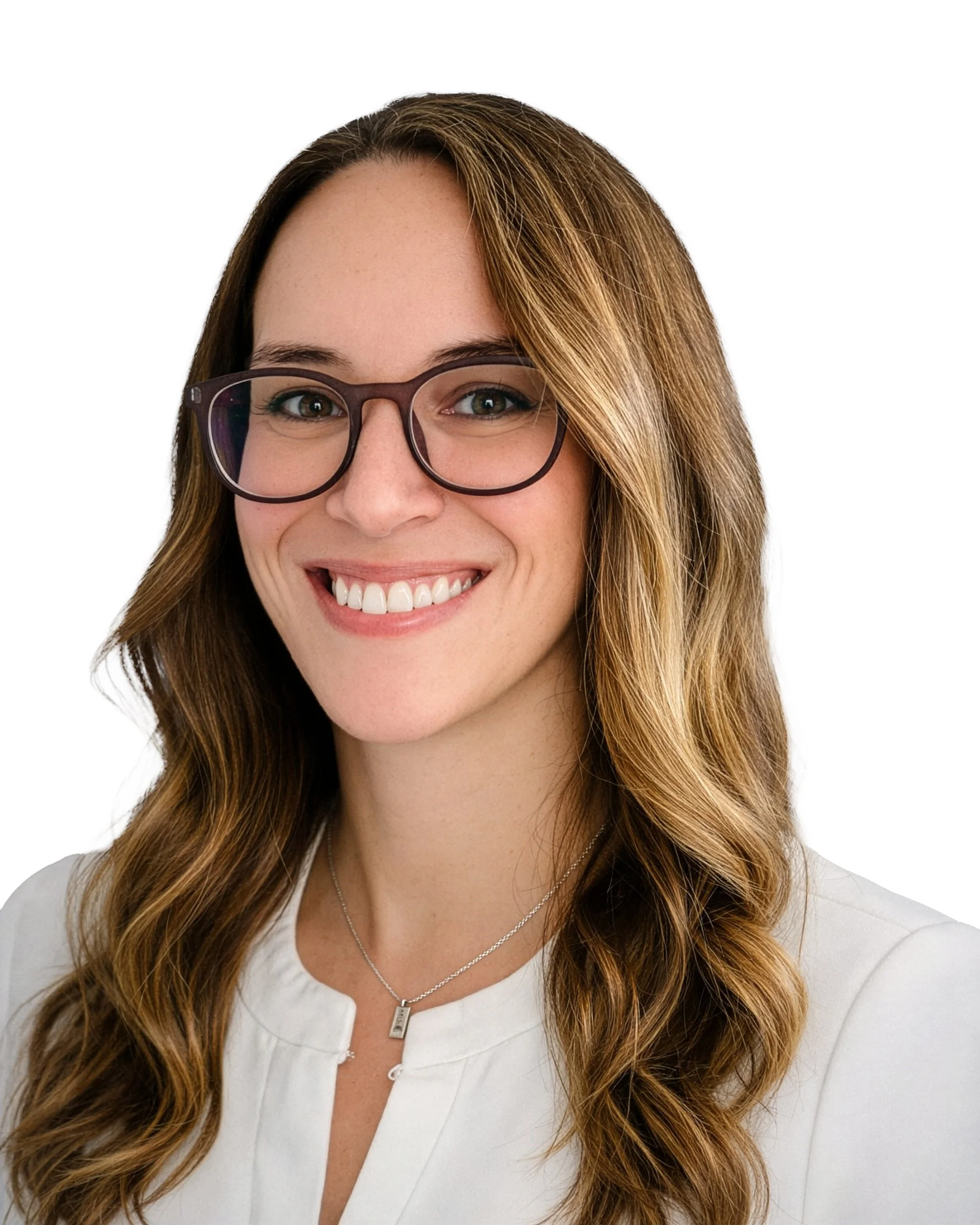 A woman with long, wavy light brown hair wearing glasses and a white top, smiling at the camera.