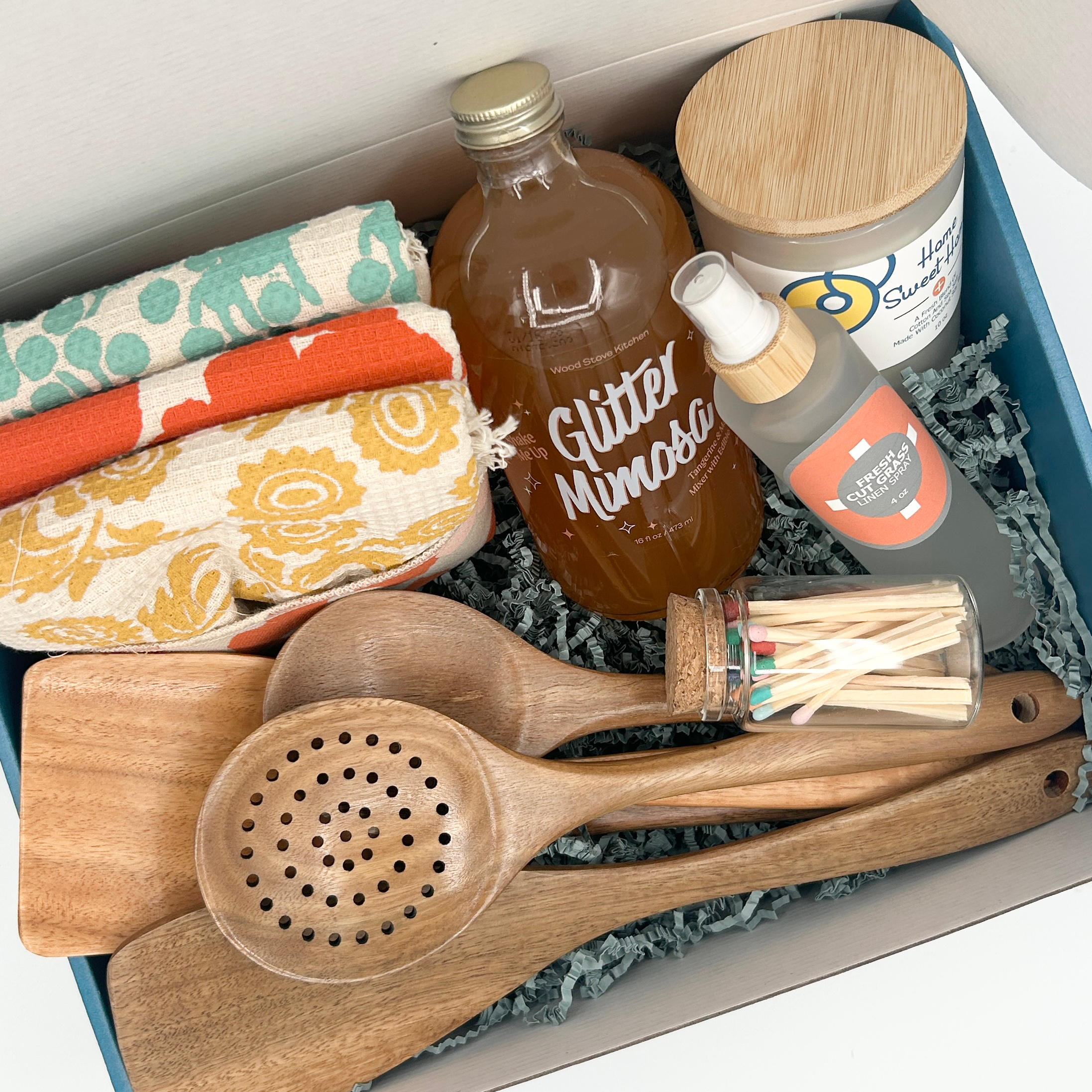 You're Home! Housewarming Gift Box | Complete New Home Celebration Kit with Tea Towels, Acacia Cooking Utensils, Glitter Mimosa Mix, Linen Sprayand and Candle