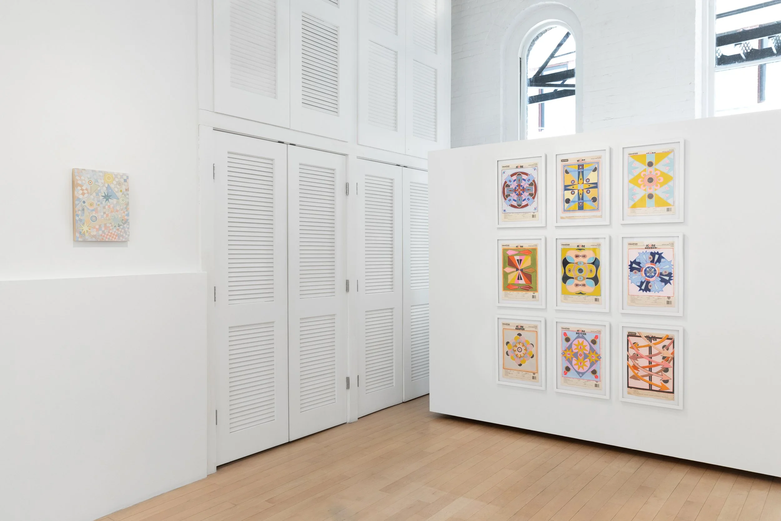 EXHIBITIONS →