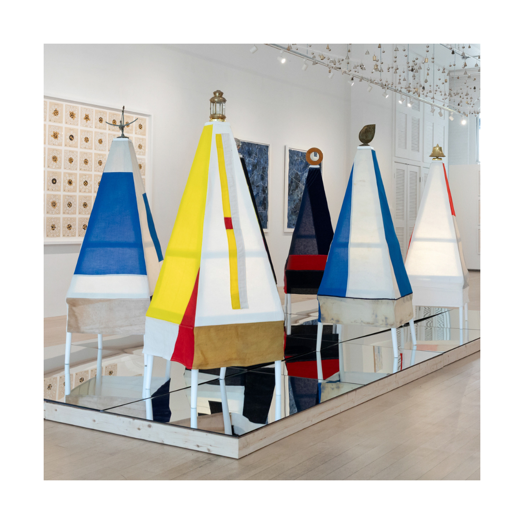 Free Beacons, 2026, sewn and pieced vintage nautical signal flags, painted wood obelisk structure 65 in. H x 27 in. diameter of base with mirror plinth. Individual works: 
S, Sierra, Sundial, Flag Hoist Drill,
A, Alpha, Nautilus, Keep Well Clear
F, F