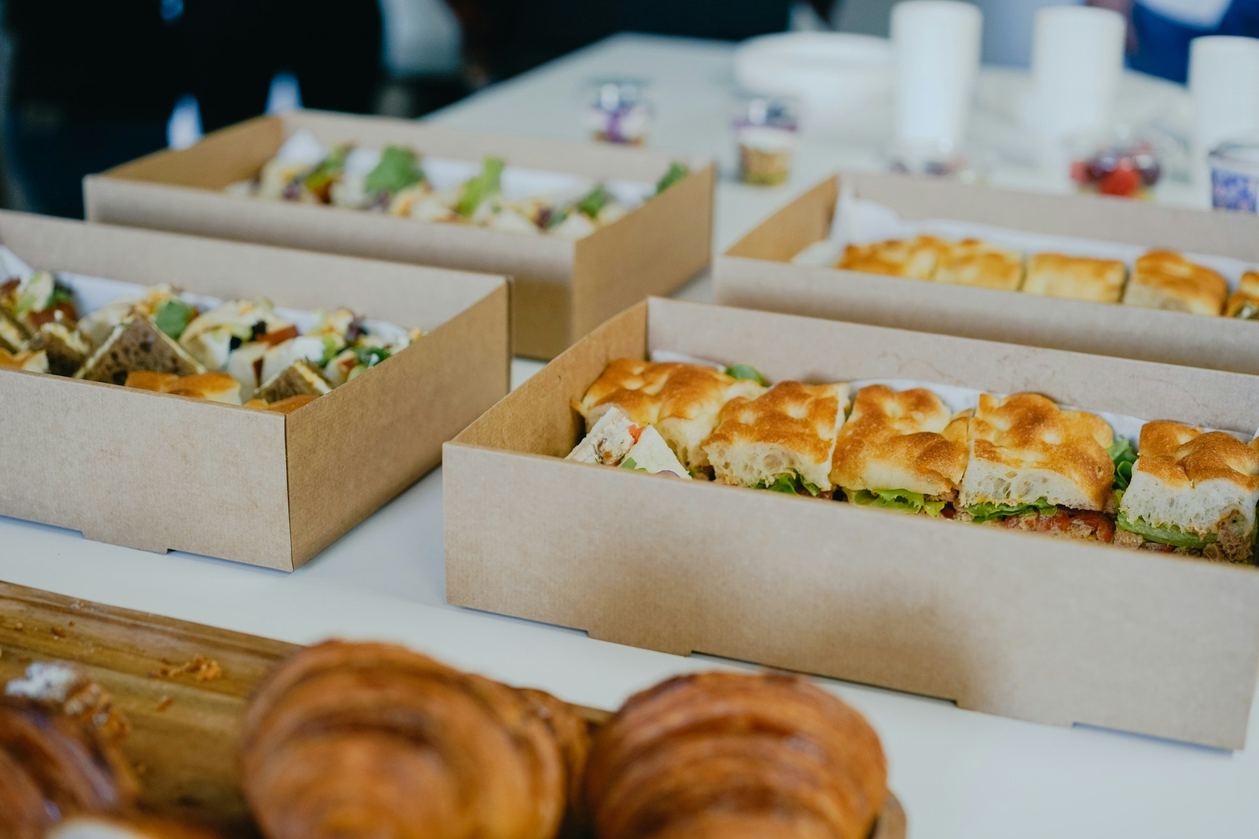 Boxed sandwiches and breakfast items from Benny's Catering in Greeley