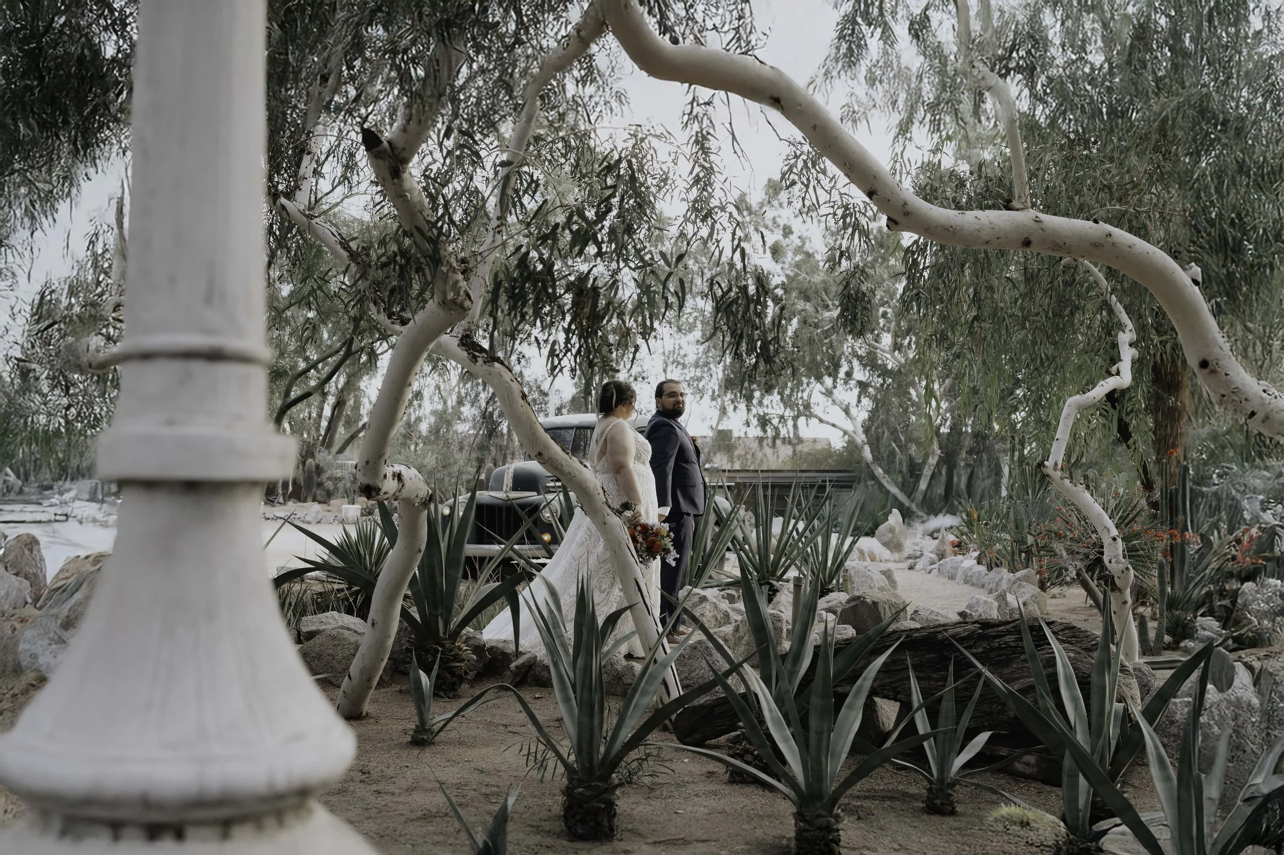 After the ceremony, Lauren and Joel explored the beautiful garden paths and adobe architecture of the Boojum Tree for their wedding portraits. Surrounded by desert greenery and warm Phoenix light, these moments captured the joy and excitement of thei