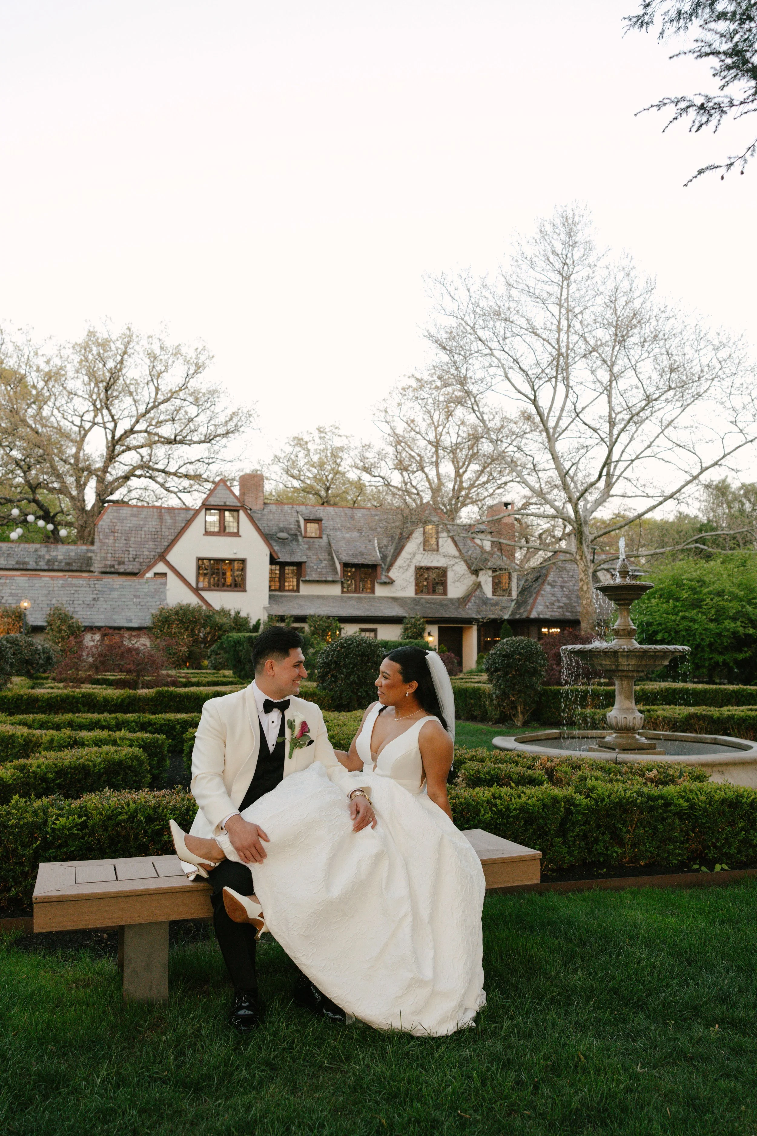 As the sun began to set, the bride and groom stepped away for golden hour portraits around the grounds of Hotel DuVillage. Captured on both digital and 35mm film, these sunset portraits highlight the warmth, romance, and quiet moments shared between 