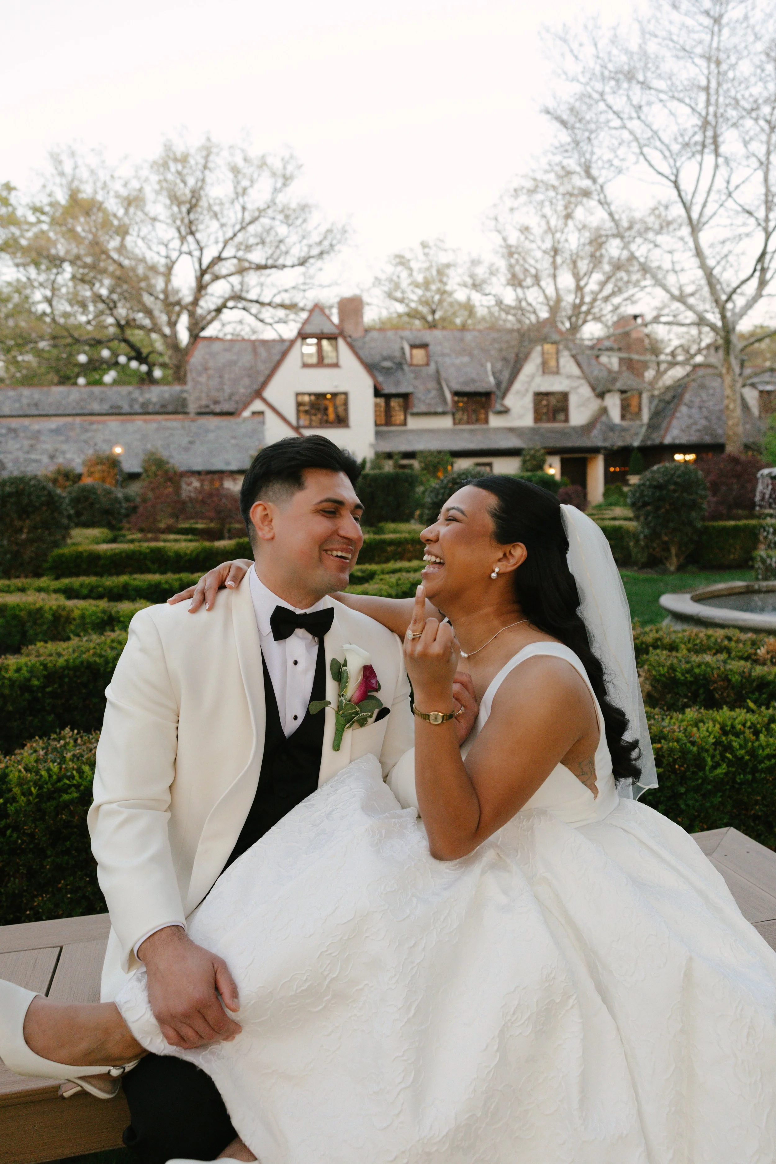 As the sun began to set, the bride and groom stepped away for golden hour portraits around the grounds of Hotel DuVillage. Captured on both digital and 35mm film, these sunset portraits highlight the warmth, romance, and quiet moments shared between 
