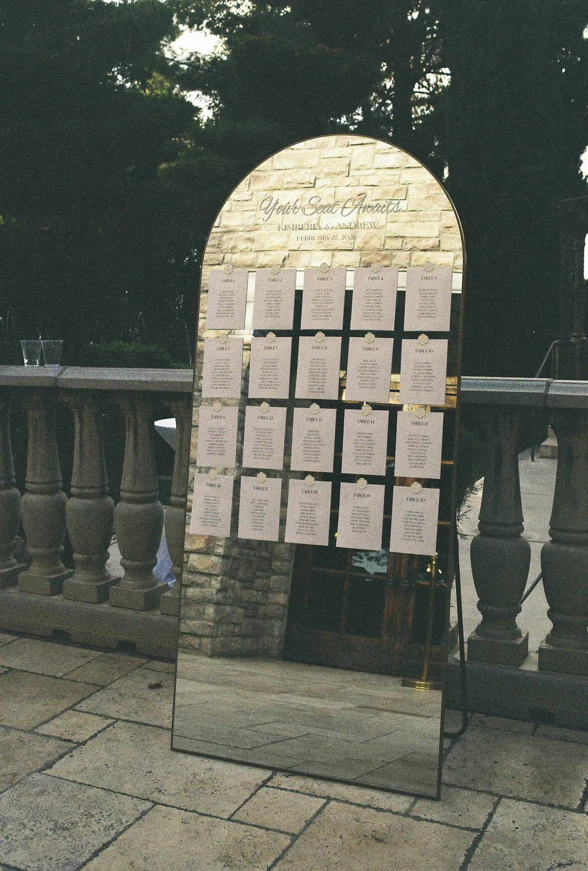 Elegant wedding details from the bride and groom’s Ashley Castle wedding in Chandler, Arizona, featuring romantic ceremony décor, personalized memorial touches, and timeless reception styling at one of Arizona’s premier luxury wedding venues.