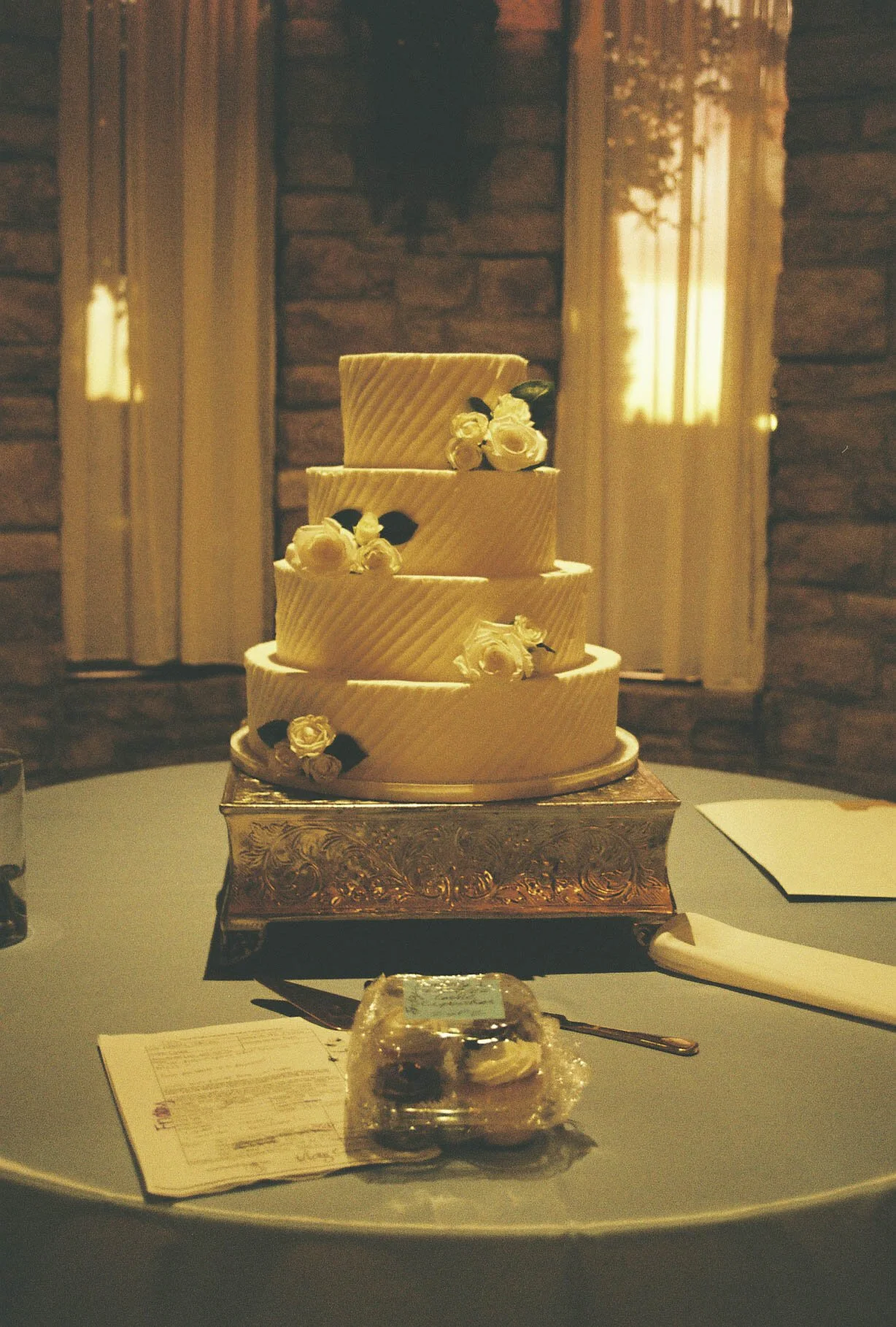 The reception celebration at Ashley Castle in Chandler, Arizona, came to life through hybrid film and digital photography, capturing elegant reception details, joyful bridal party entrances, and lively dance floor moments inside the castle’s grand ba