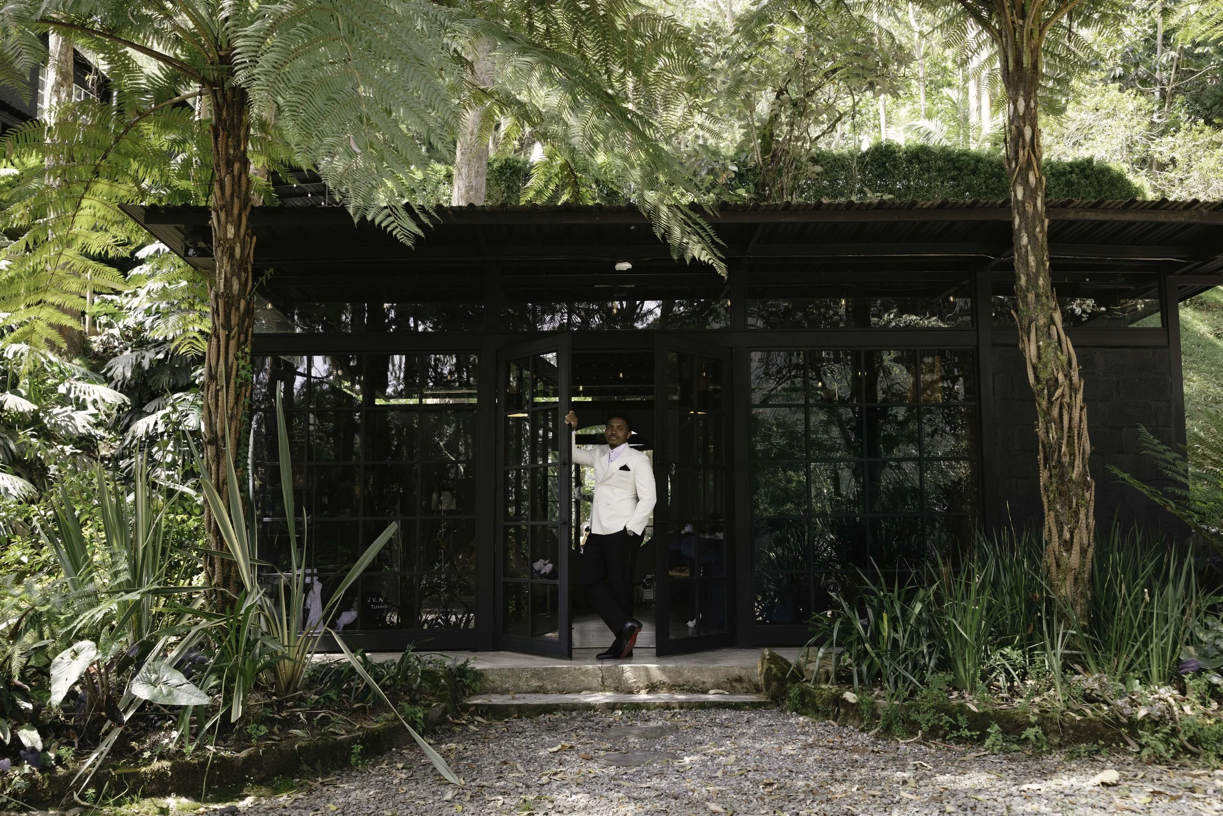 Destination wedding groom portraits at Forest Campestre in Medellín, Colombia featuring modern wedding attire, groomsmen portraits, formal wedding party photos, and documentary wedding photography