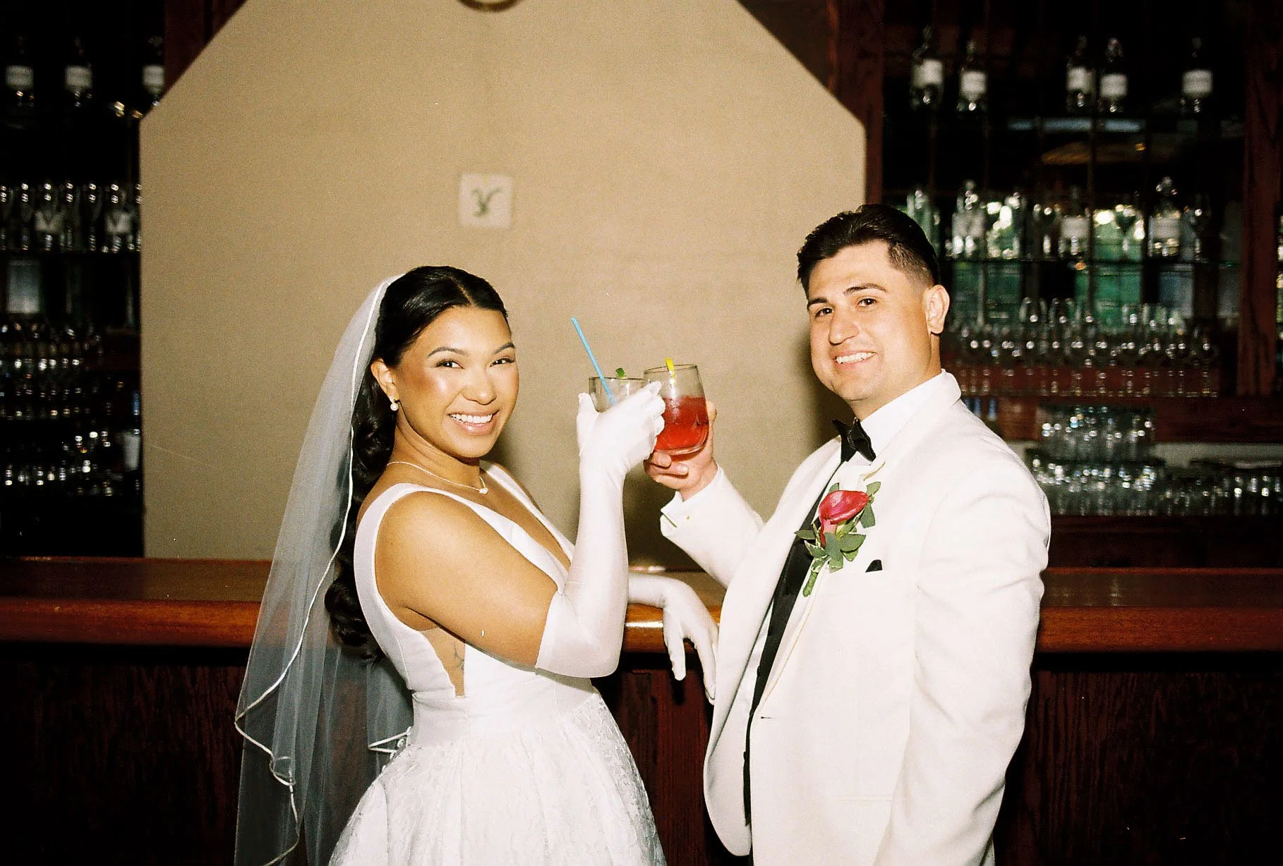 Bride and groom portraits at Hotel DuVillage showcase the venue's picturesque gardens, waterfront views, and timeless charm. Photographed on both digital and 35mm film, these wedding portraits focus on authentic connection, natural movement, and cand