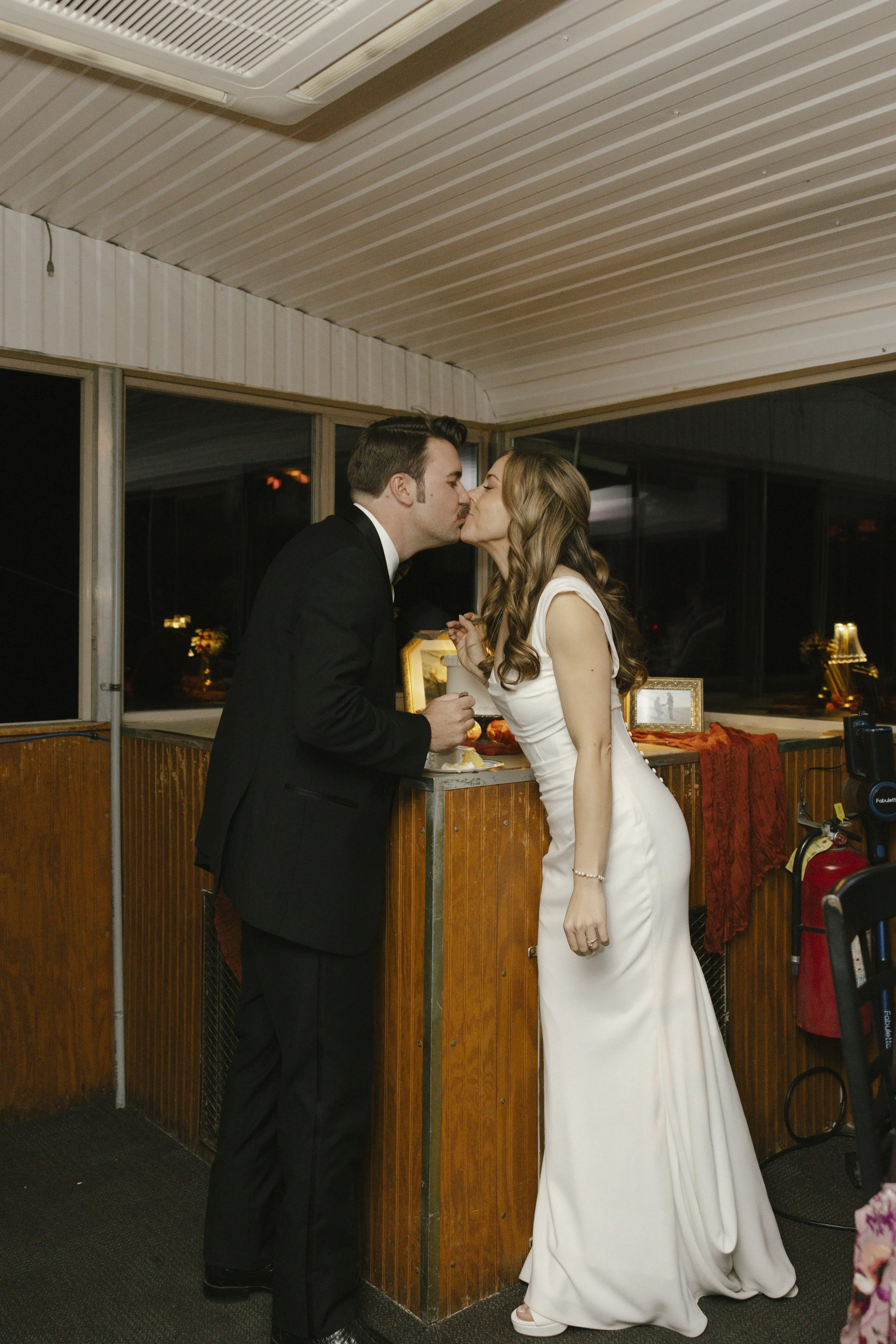 To close out the evening aboard the Dolly Steamboat, the couple shared their cake cutting surrounded by family and friends. It was a sweet and joyful moment that wrapped up their Canyon Lake wedding celebration with laughter, love, and one last toast
