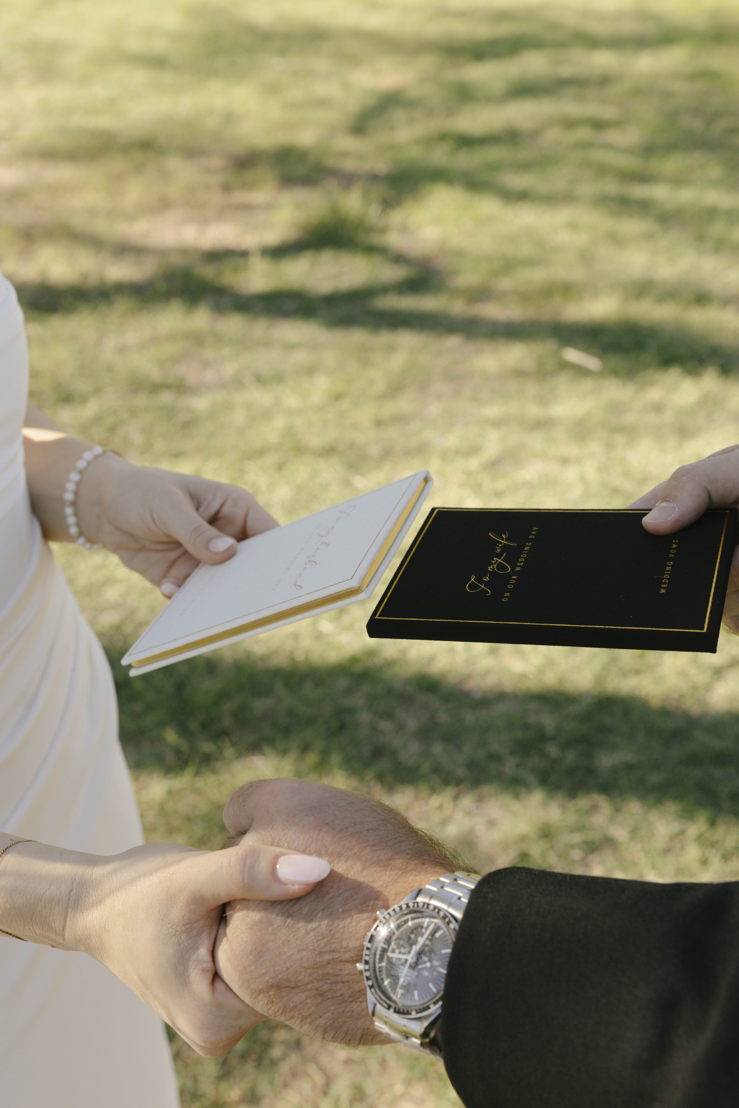 Before boarding the Dolly Steamboat, the couple shared a quiet first look along the shoreline of Canyon Lake. Surrounded by the desert mountains and calm water, they exchanged private vows in an intimate moment before the celebration began. The peace