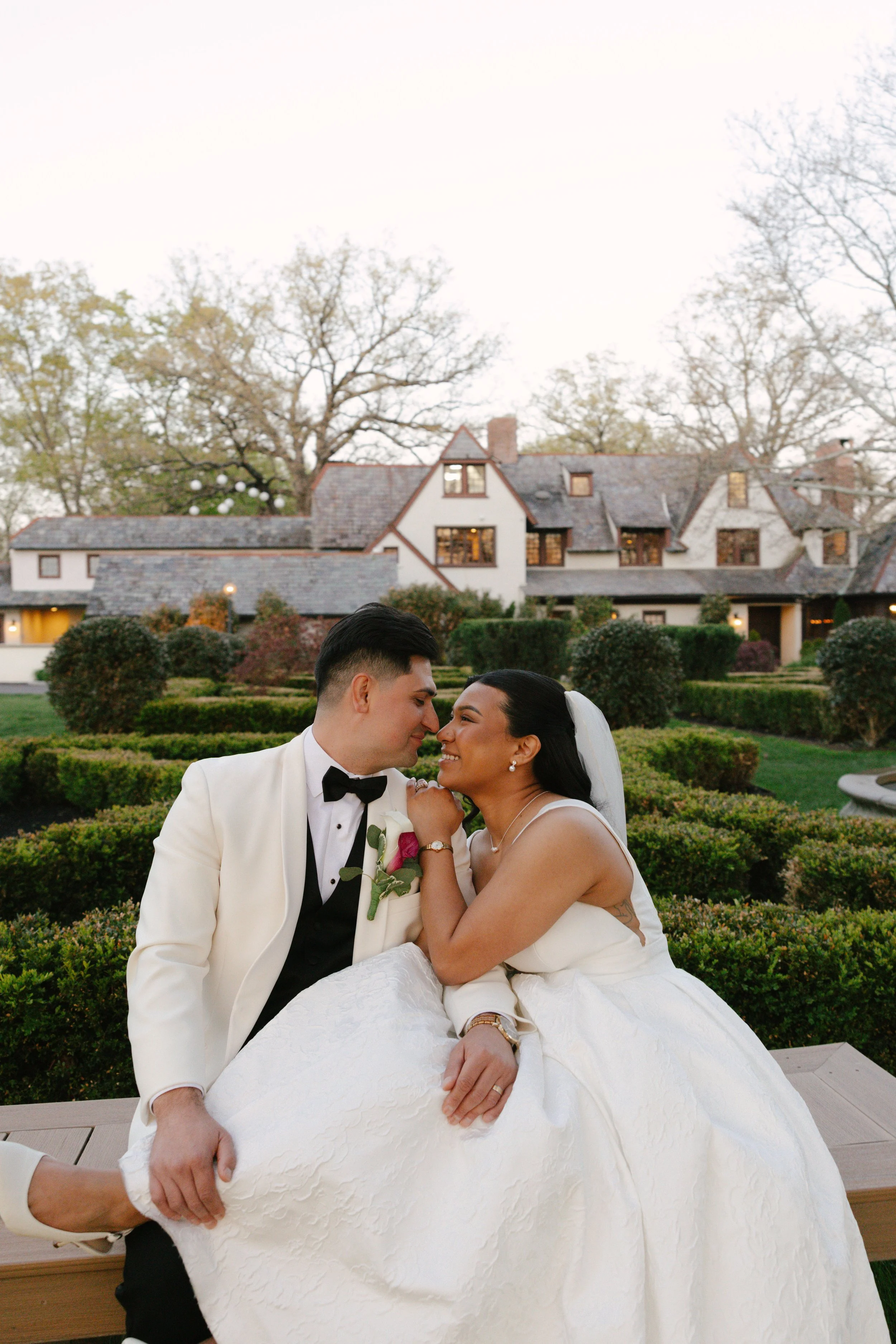 As the sun began to set, the bride and groom stepped away for golden hour portraits around the grounds of Hotel DuVillage. Captured on both digital and 35mm film, these sunset portraits highlight the warmth, romance, and quiet moments shared between 