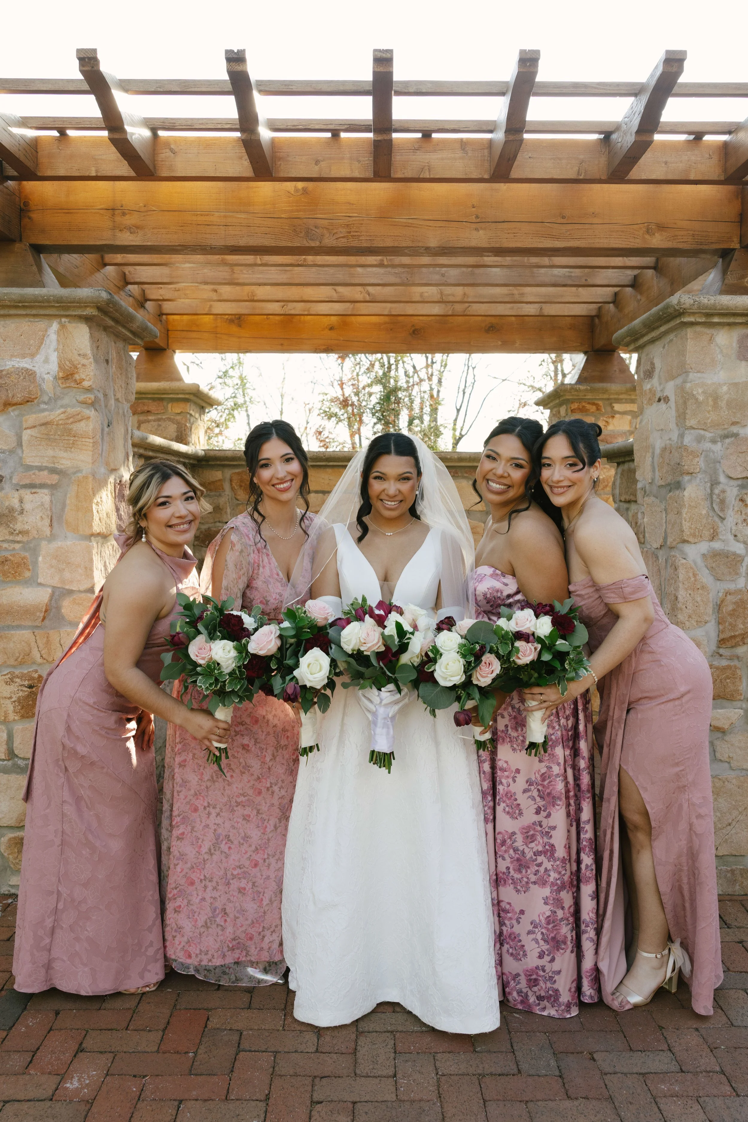 Bridal party portraits at Hotel DuVillage celebrate the bride and groom alongside their closest friends and family. Captured on digital and 35mm film, these images highlight genuine laughter, timeless portraits, and unforgettable moments.