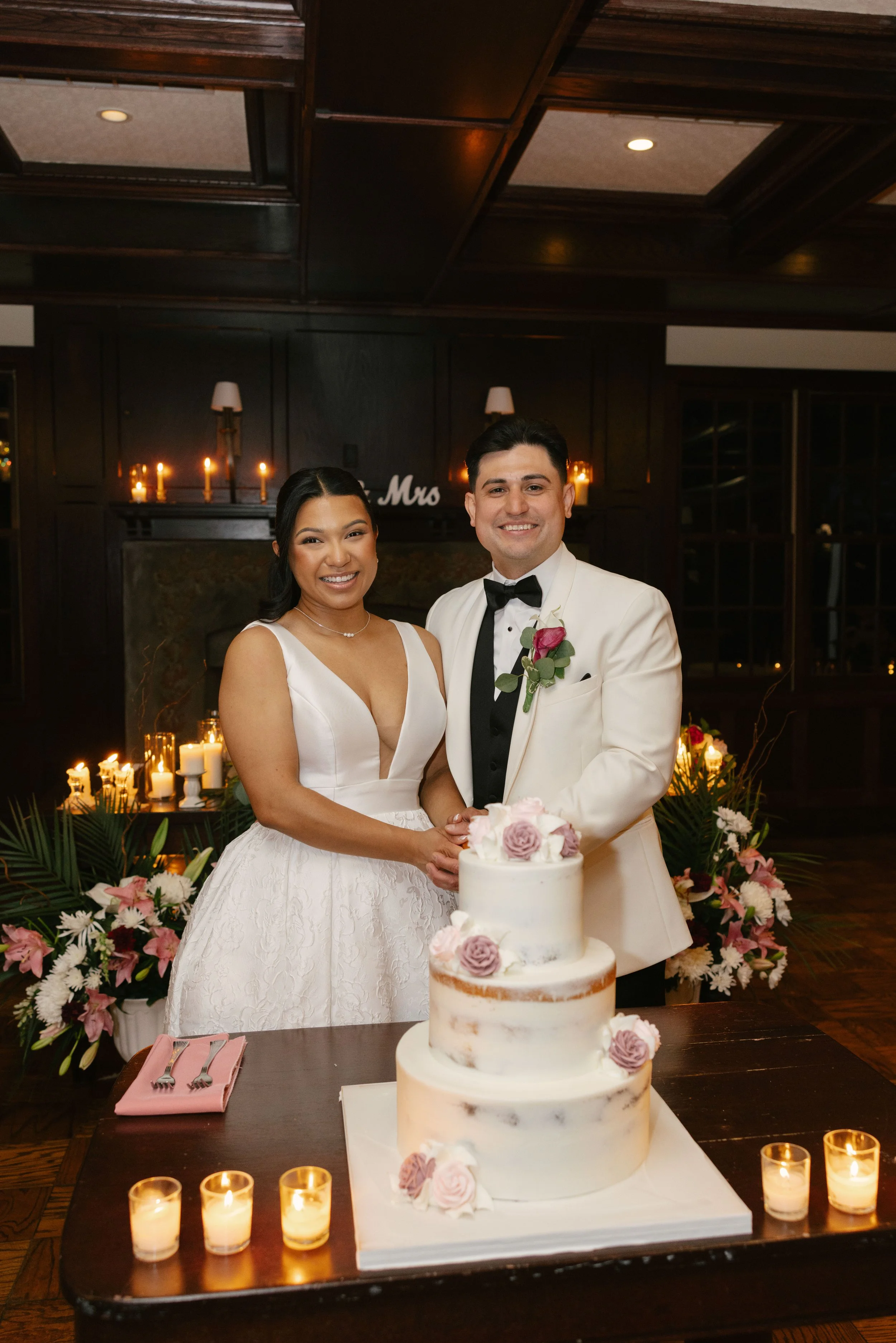 The bride and groom celebrated another unforgettable milestone by cutting their wedding cake together at Hotel DuVillage. Captured on both digital and 35mm film, these sweet moments were filled with laughter, celebration, and the joy of sharing one o