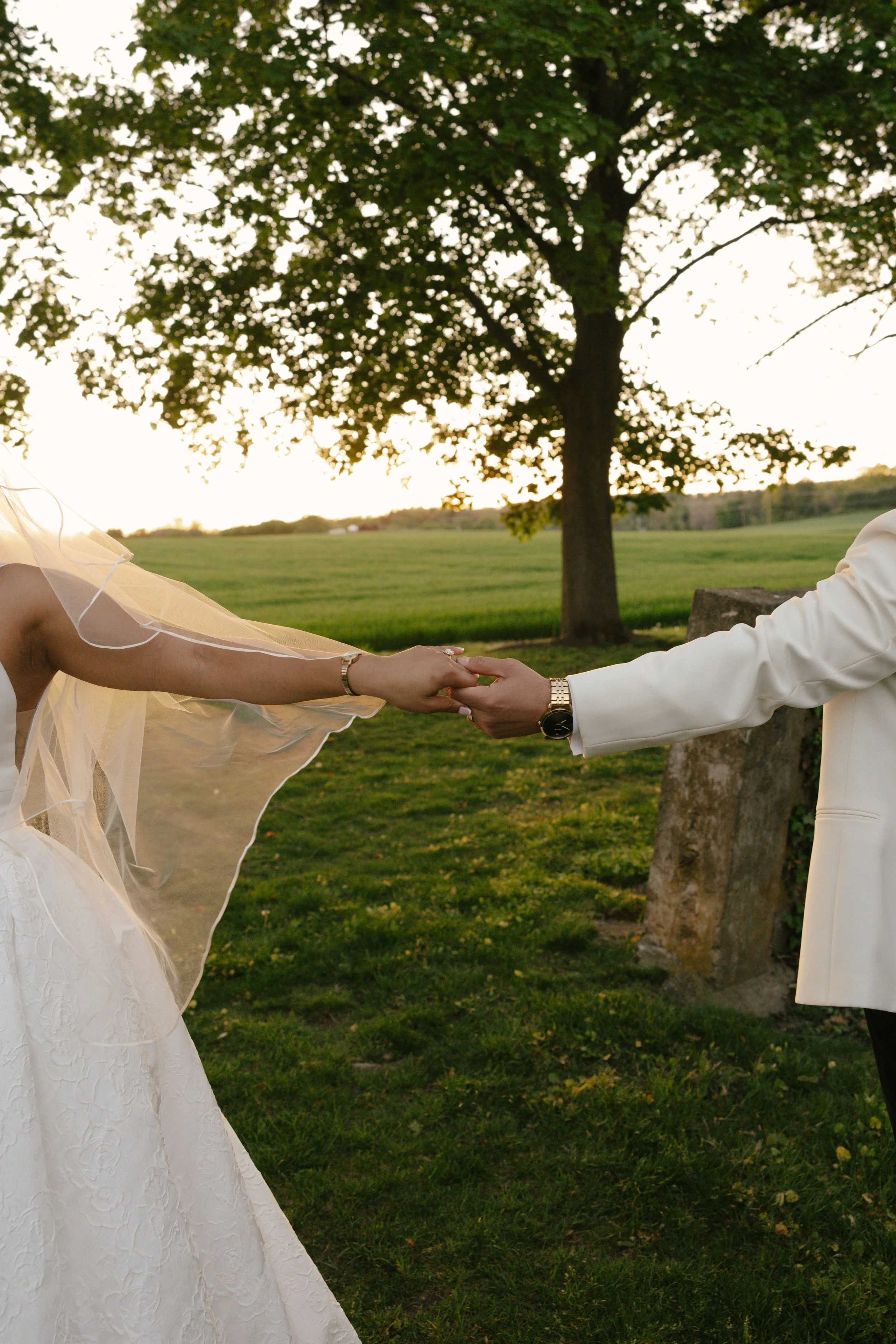 As the sun began to set, the bride and groom stepped away for golden hour portraits around the grounds of Hotel DuVillage. Captured on both digital and 35mm film, these sunset portraits highlight the warmth, romance, and quiet moments shared between 