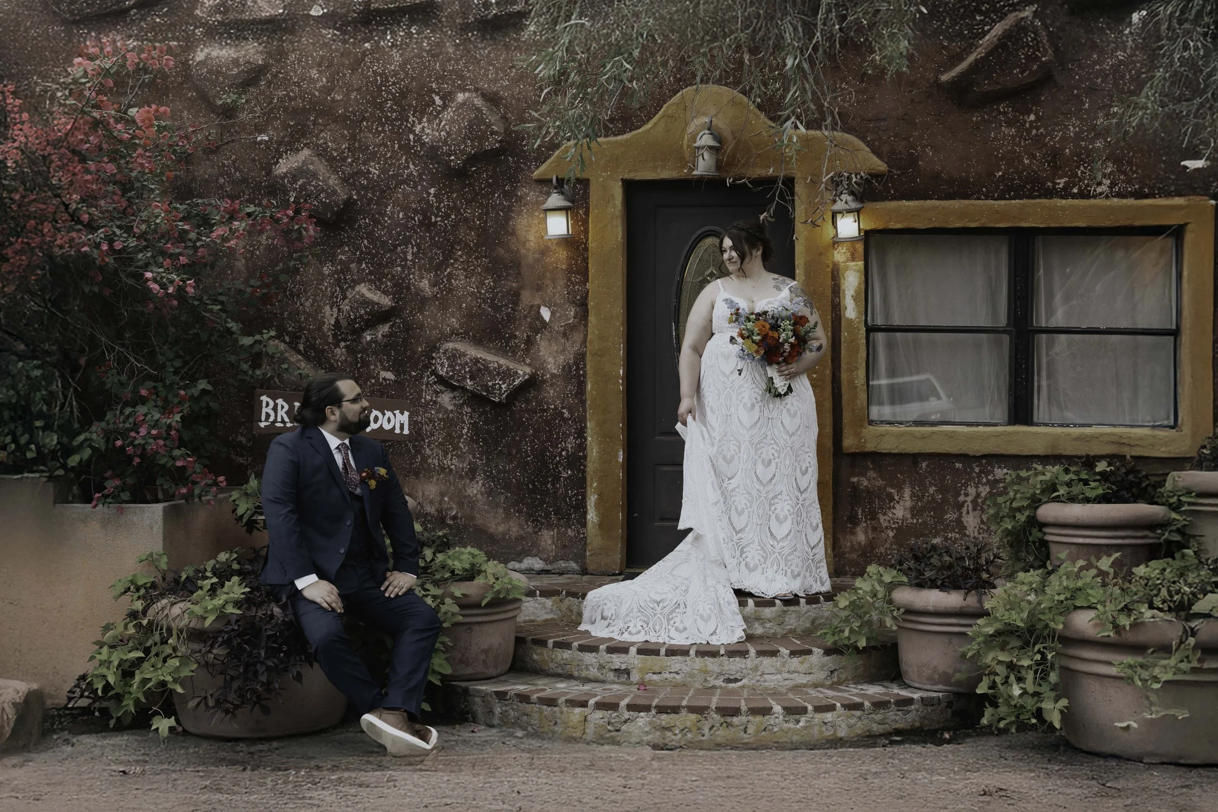 After the ceremony, Lauren and Joel explored the beautiful garden paths and adobe architecture of the Boojum Tree for their wedding portraits. Surrounded by desert greenery and warm Phoenix light, these moments captured the joy and excitement of thei