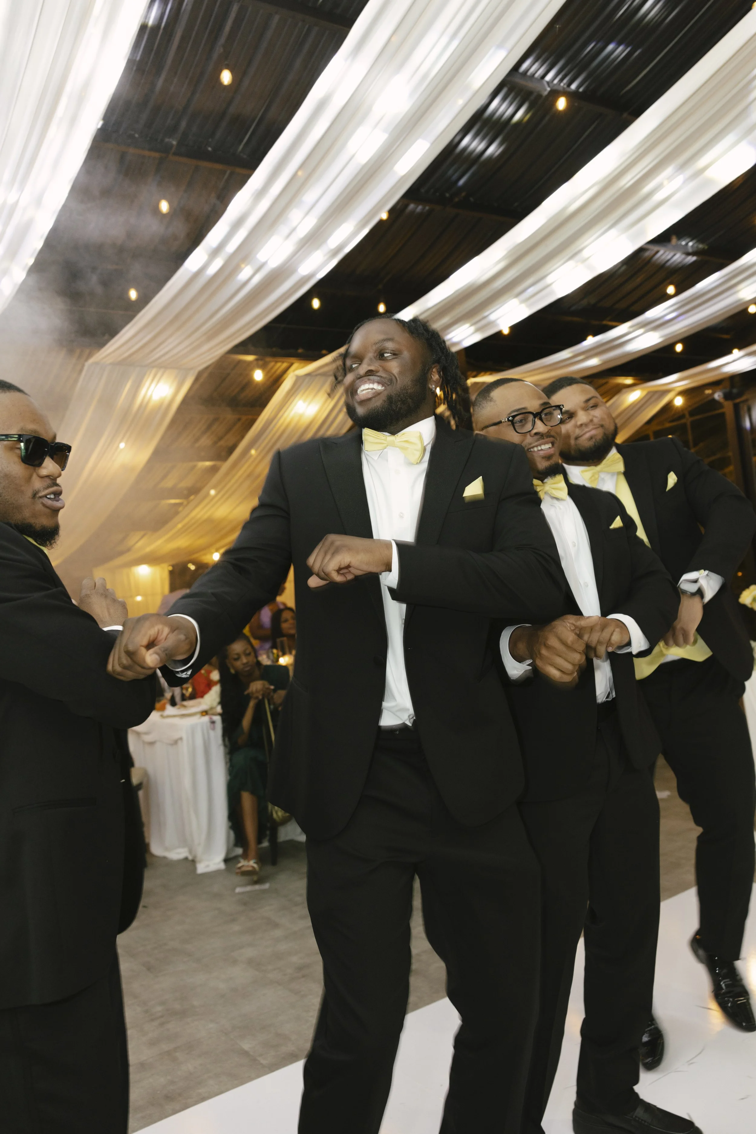 Wedding reception at Forest Campestre in Medellín, Colombia featuring the couple's first dance, parent dances, dance floor celebration, wedding desserts, and candid documentary wedding photography.
