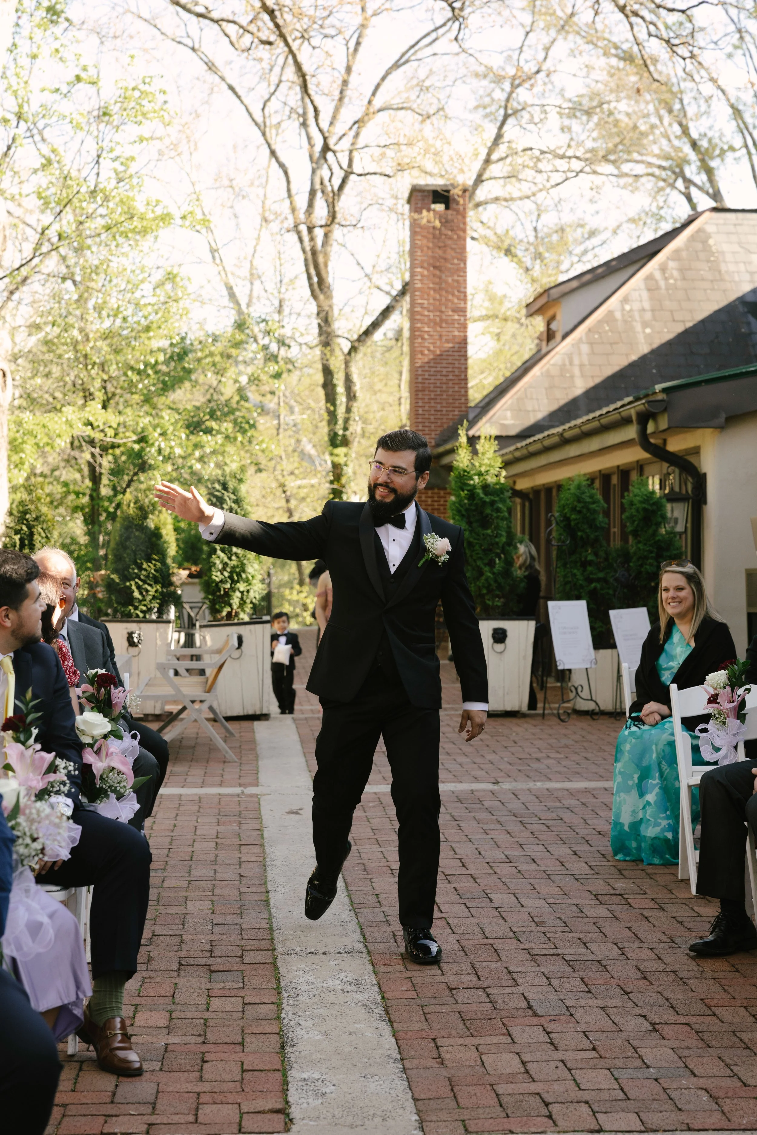 Outdoor wedding ceremony at Hotel DuVillage featuring the bride and groom, wedding party, and meaningful moments captured on both digital and 35mm film. A timeless celebration documented with a candid, documentary approach