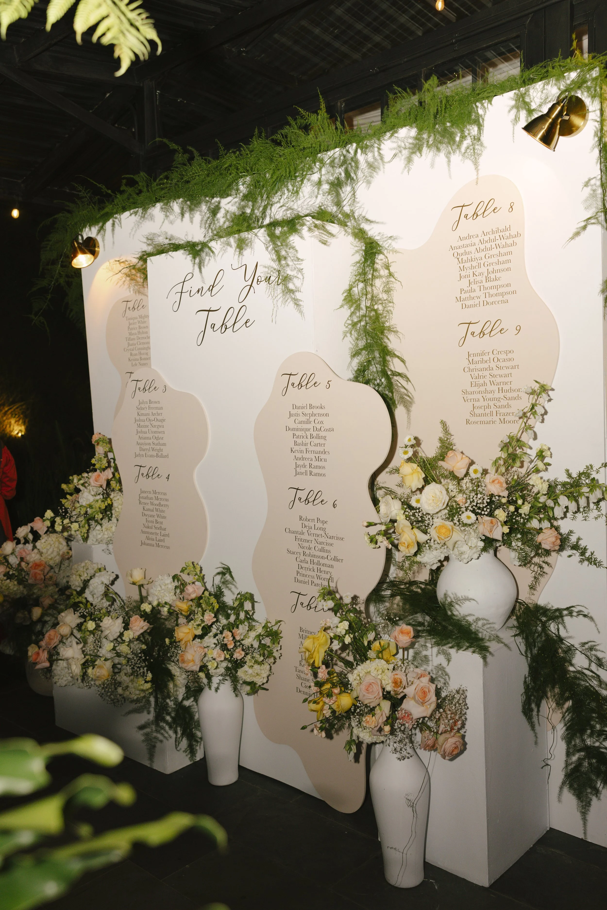 Wedding reception details at Forest Campestre in Medellín, Colombia featuring elegant reception décor, floral tablescapes, wedding cake, custom signage, first dance, and lively celebration captured through documentary wedding photography