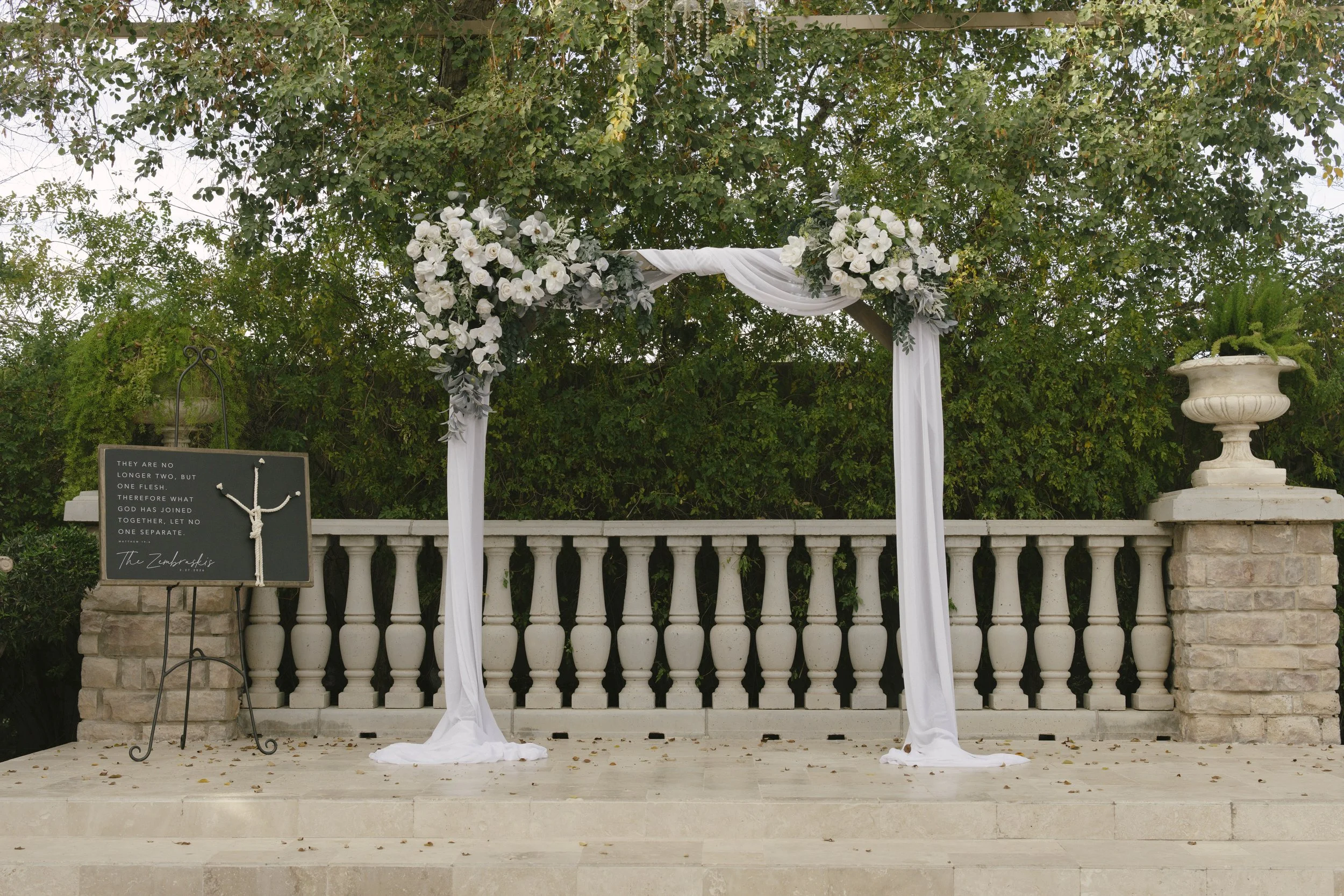 Ceremony details at Ashley Castle in Chandler, Arizona, were thoughtfully captured through hybrid film and digital photography, highlighting elegant signage, romantic seating displays, and the bridesmaid processional as guests gathered for this timel