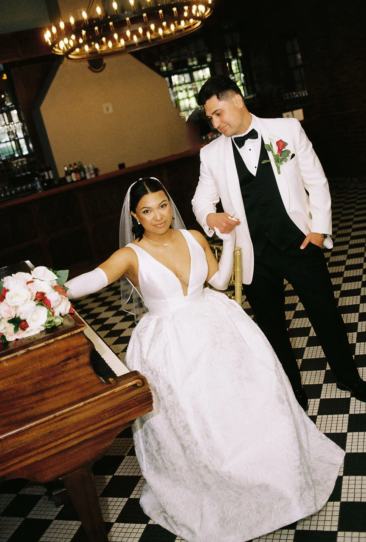 Bride and groom portraits at Hotel DuVillage showcase the venue's picturesque gardens, waterfront views, and timeless charm. Photographed on both digital and 35mm film, these wedding portraits focus on authentic connection, natural movement, and cand